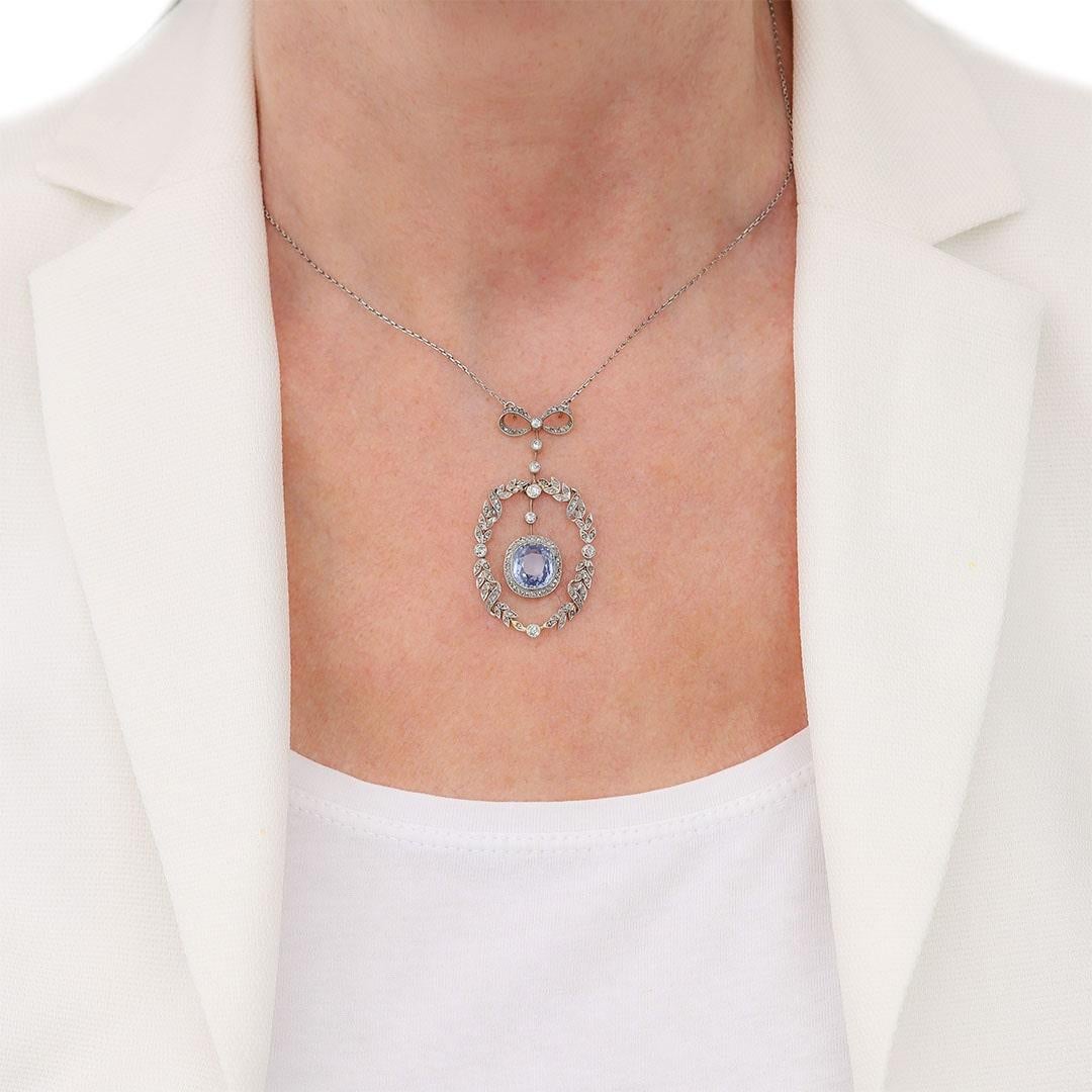 A stunning Victorian 5.35ct no treatment, certified Ceylon (Sri Lankan) cushion cut sapphire and diamond pendant made in the Belle Epoque style. This superb necklet has a central pale cornflower blue sapphire and is surrounded by an estimated 1ct of