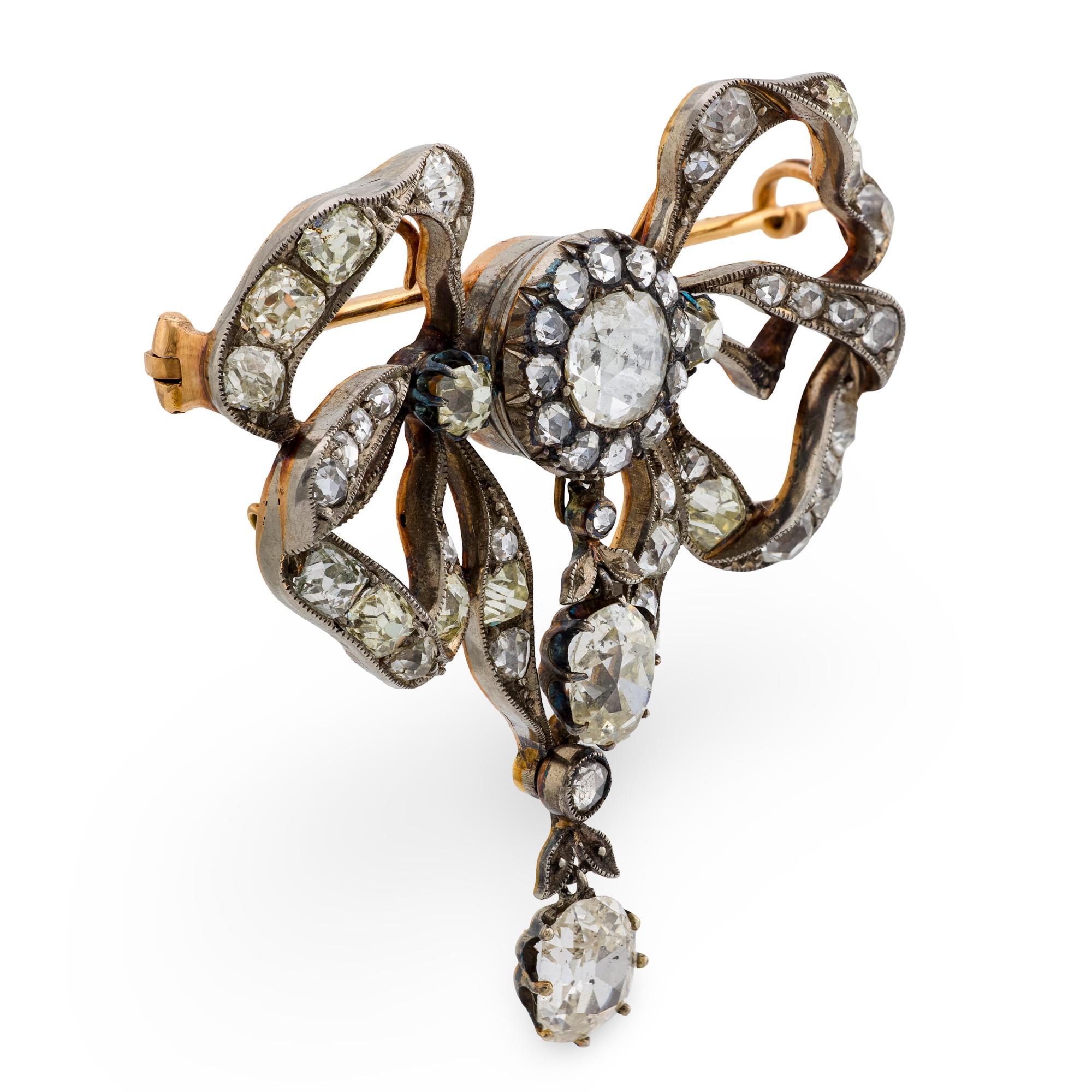Victorien Broche victorienne en or rose 14k et argent, ornée d'un diamant de 5,50 carats. en vente