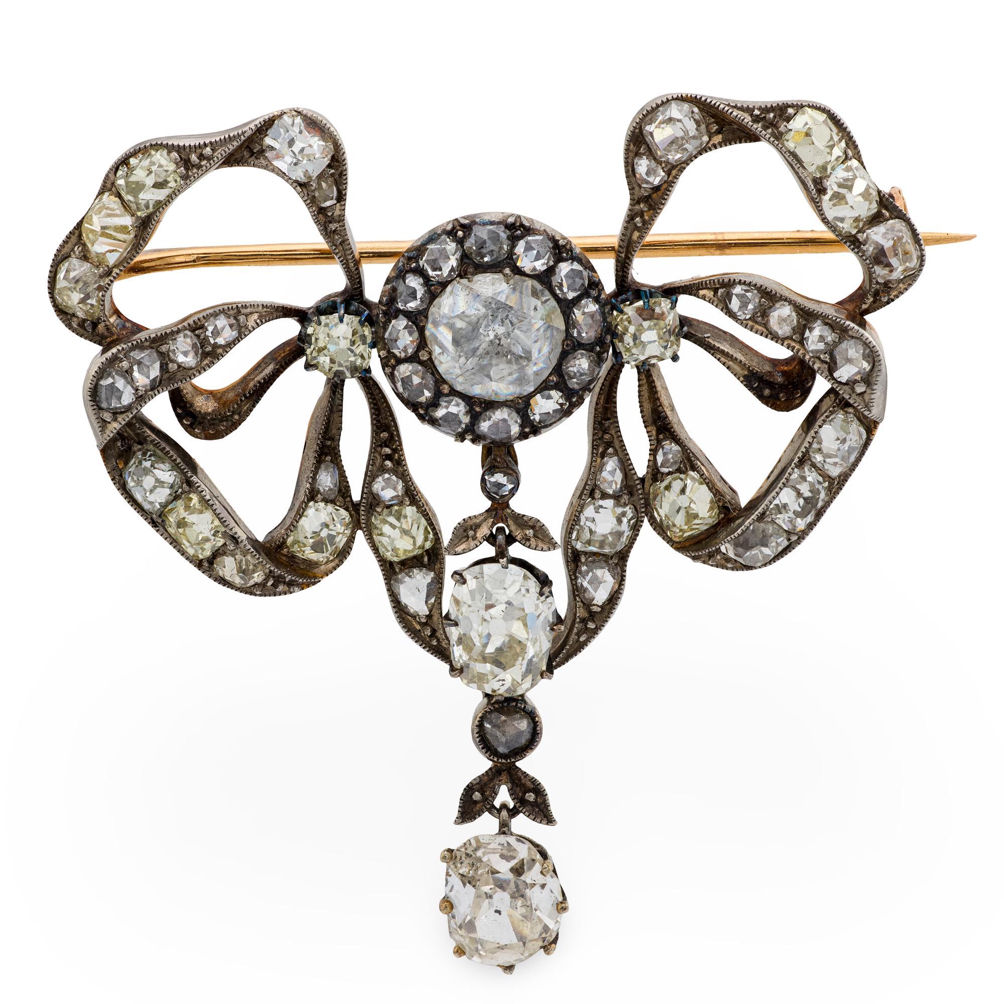 Broche victorienne en or rose 14k et argent, ornée d'un diamant de 5,50 carats. en vente