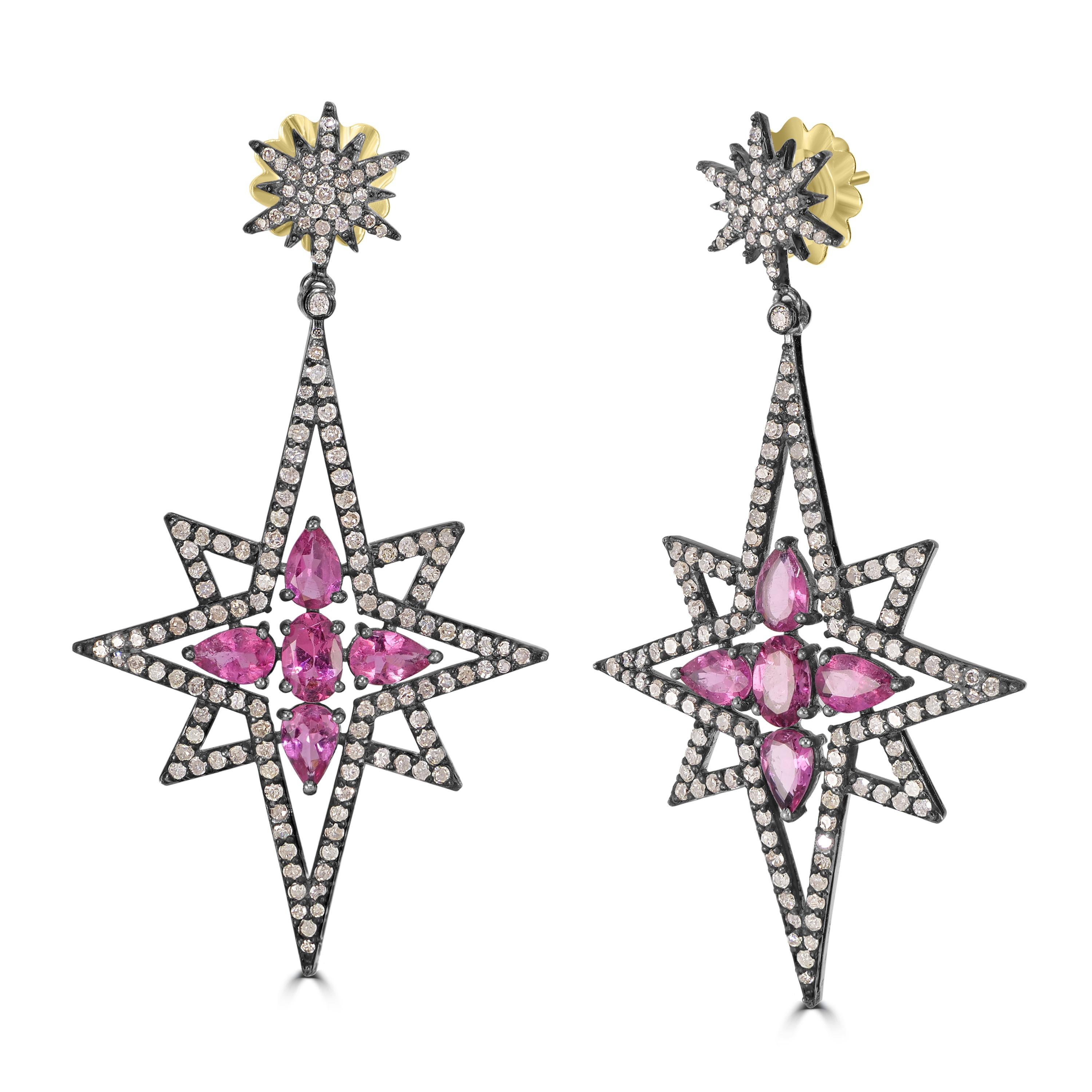 Introducing the Victorian 5.87 Cttw. Tourmaline and Diamond Star Dangle Earrings—a celestial dance of elegance and sophistication.

At the summit of these earrings, a radiant star surmount, bedazzled with diamonds on a black rhodium top, sets the