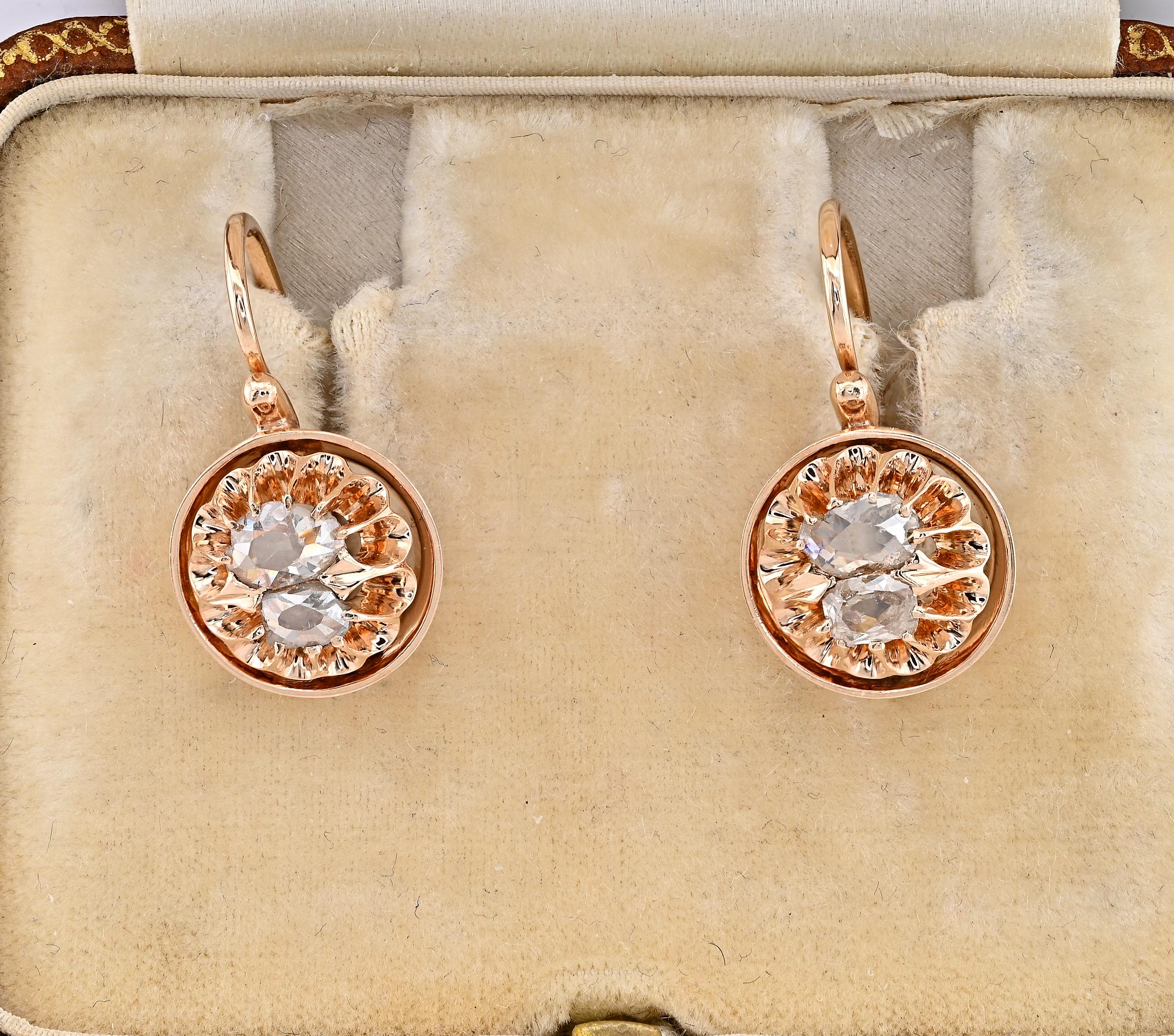 Victorian Treasure
Sweatiest antique Victorian Diamond Earrings, lovely in design, artful crafted in 18 Kt gold
Set with four beautiful bright white antique table cut Diamond, in group of two on each earring, totalling .60 Ct , rated G/H VS/SI,