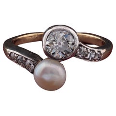 Victorian .60 Ct Diamond 6mm. Natural Pearl Crossover ring