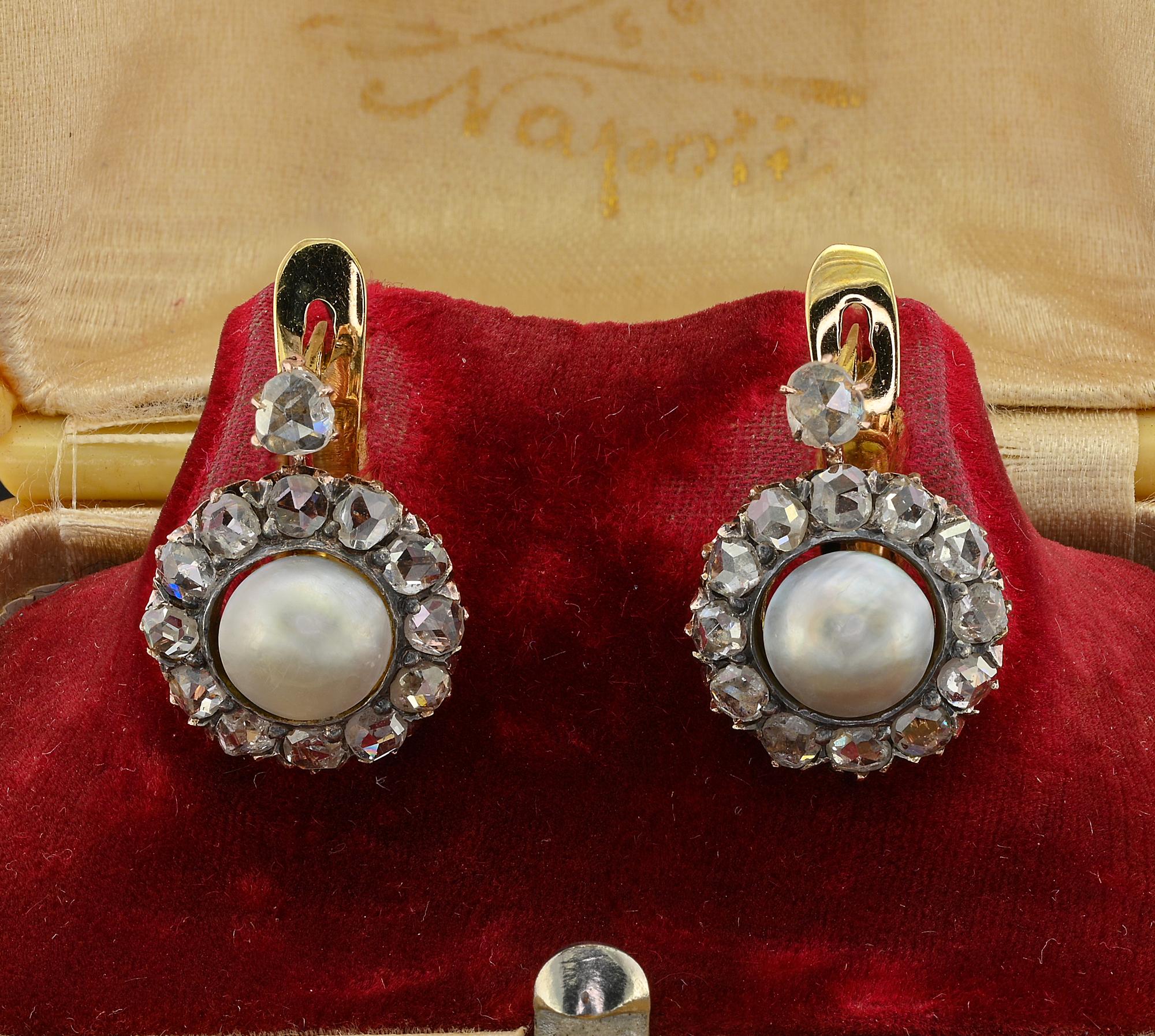These very pretty antique Victorian era earrings are 1880 circa

Finely hand crafted of solid 18 KT gold in Traditional Victorian cluster design
Their lovely round shape display a couple of – not nucleated – salt water sea Pearls, ranging in sizes