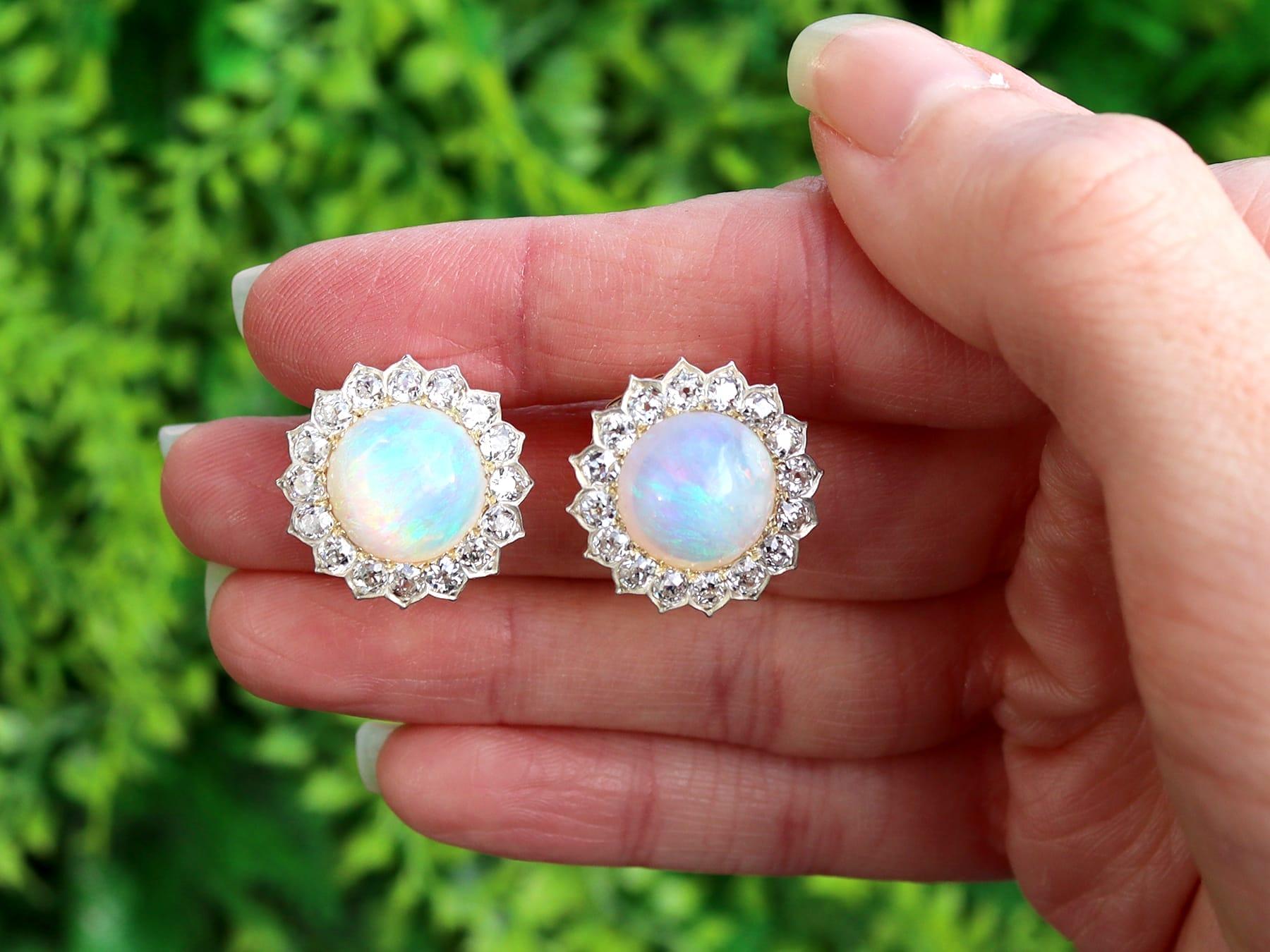 An impressive pair of 7.76 carat white opal and 2.05 carat diamond, 9 karat yellow gold and 9 karat white gold set clip on earrings; part of our diverse antique jewelry collections.

These fine and impressive Victorian cabochon cut opal earrings