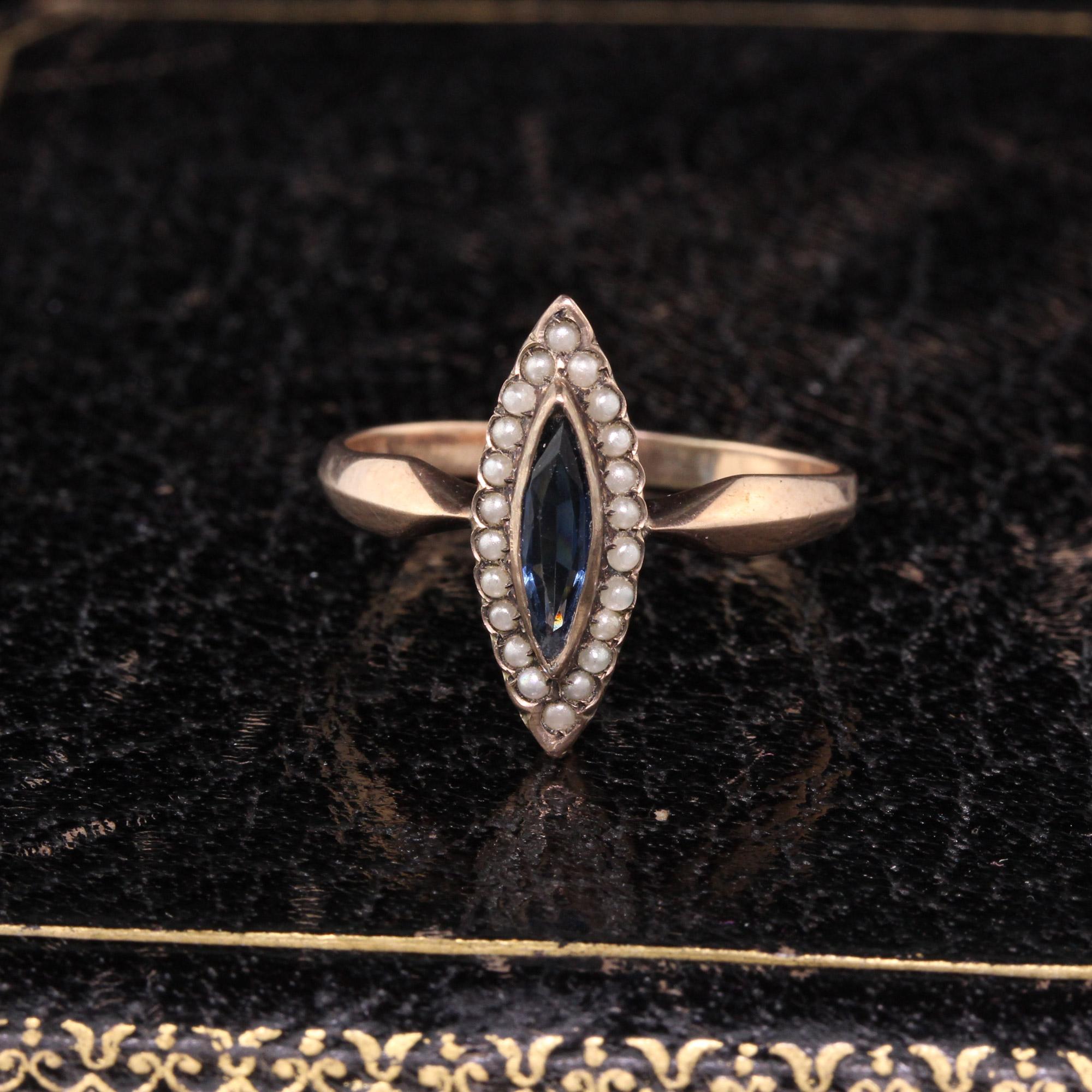 Gorgeous Victorian 8K Rose Gold navette ring a sapphire center and a halo of seed pearls.

#R0322

Metal: 8K Rose Gold

Weight: 2.0 Grams

Center Stone: Sapphire 

Center Stone Size: 2.9 mm x 9.2 mm

Ring Size: 8

This ring can be sized for a $50