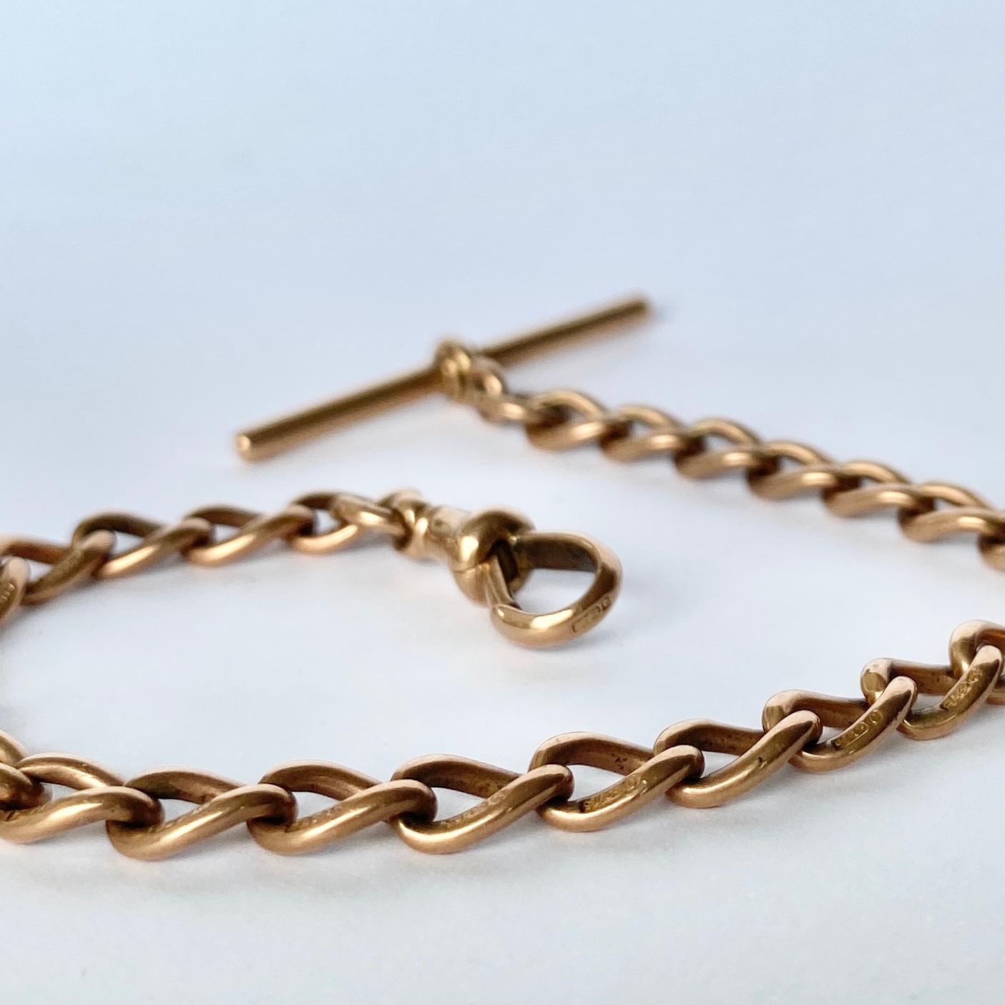 This glossy 9carat gold bracelet is made of solid gold and features a dog clip one end and a t-bar on the other.  Every curb link is hallmaked.

Length: 19.5cm
Width: 6mm

Weight: 14.3g