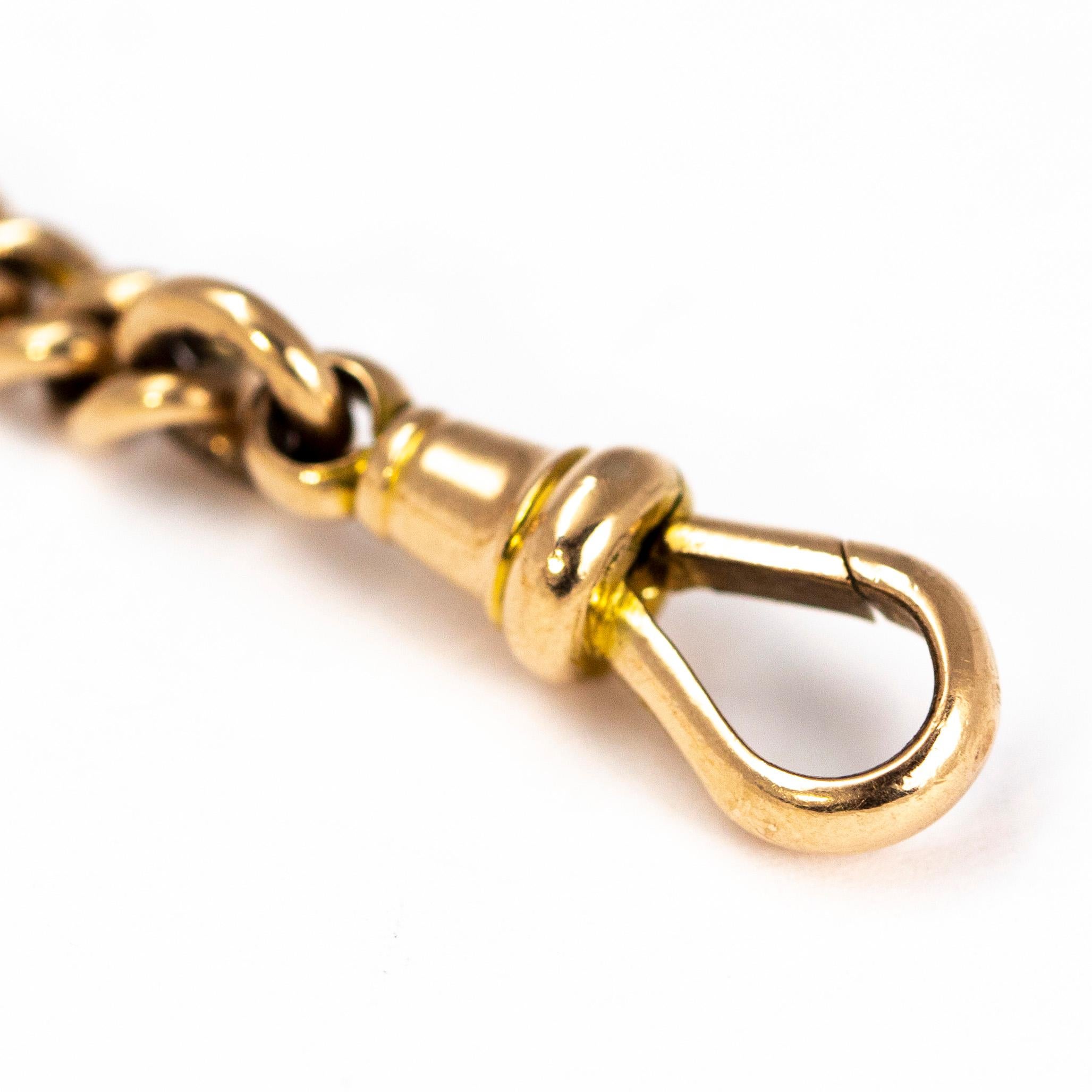 This glossy 9carat gold bracelet is made of solid gold and features a dog clip one end and a t-bar on the other.  Every curb link is hallmaked.

Length: 6.5inches 
Width: 5mm

Weight: 13.8g