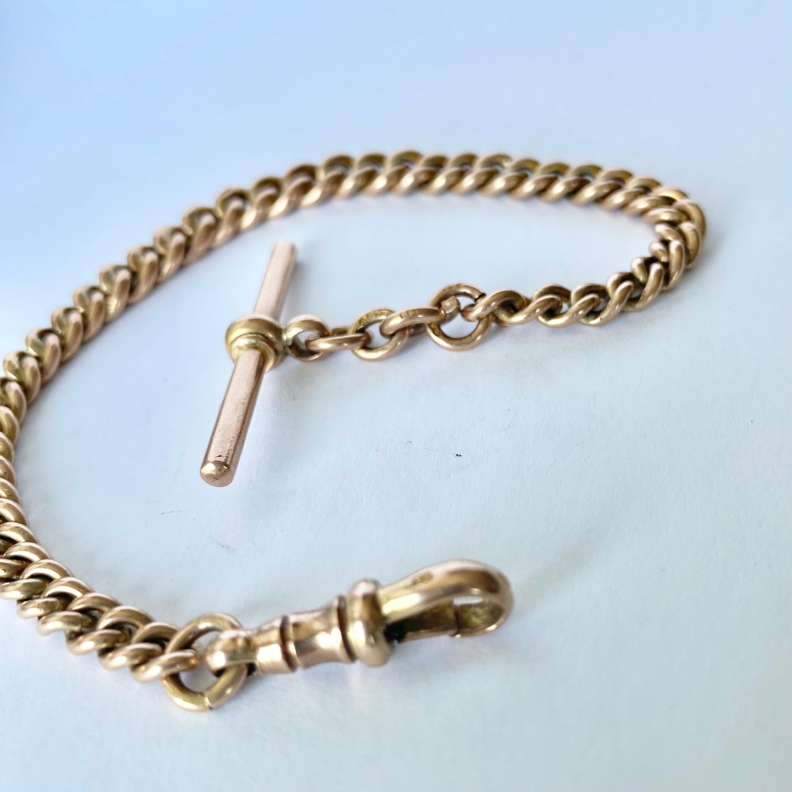 This glossy 9carat gold bracelet is made of solid gold and features a dog clip one end and a t-bar on the other.  Every curb link is hallmaked.

Length: 20cm
Width: 6-4.5mm

Weight: 22g
