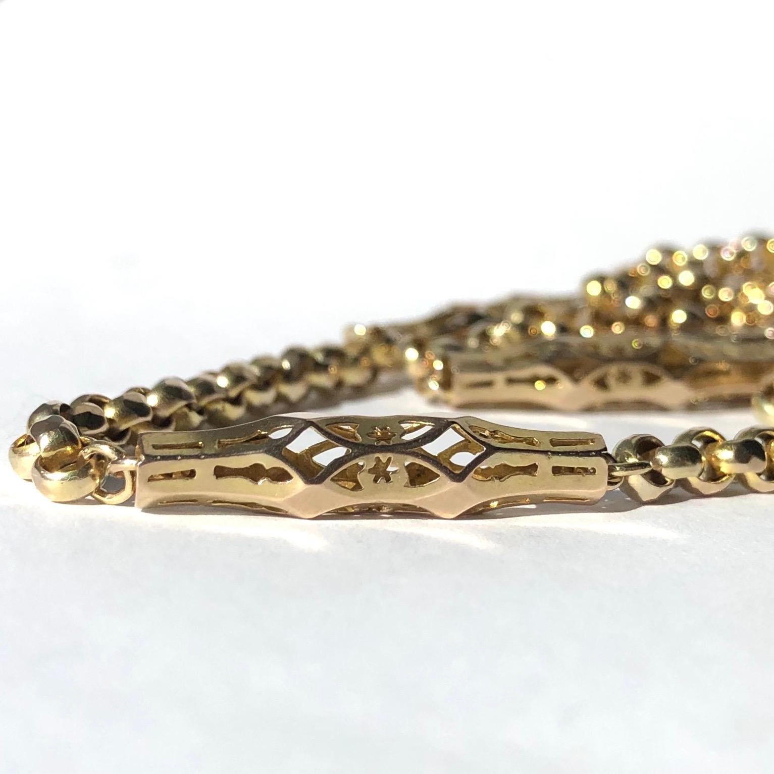 The links on this chain are simply stunning! They measure 22mm long and the open work gold is so delicate and ornate. Connecting these links is a classic belcher style chain and there is a dog clip attached. 

Length: 153cm

Weight: 50.3g