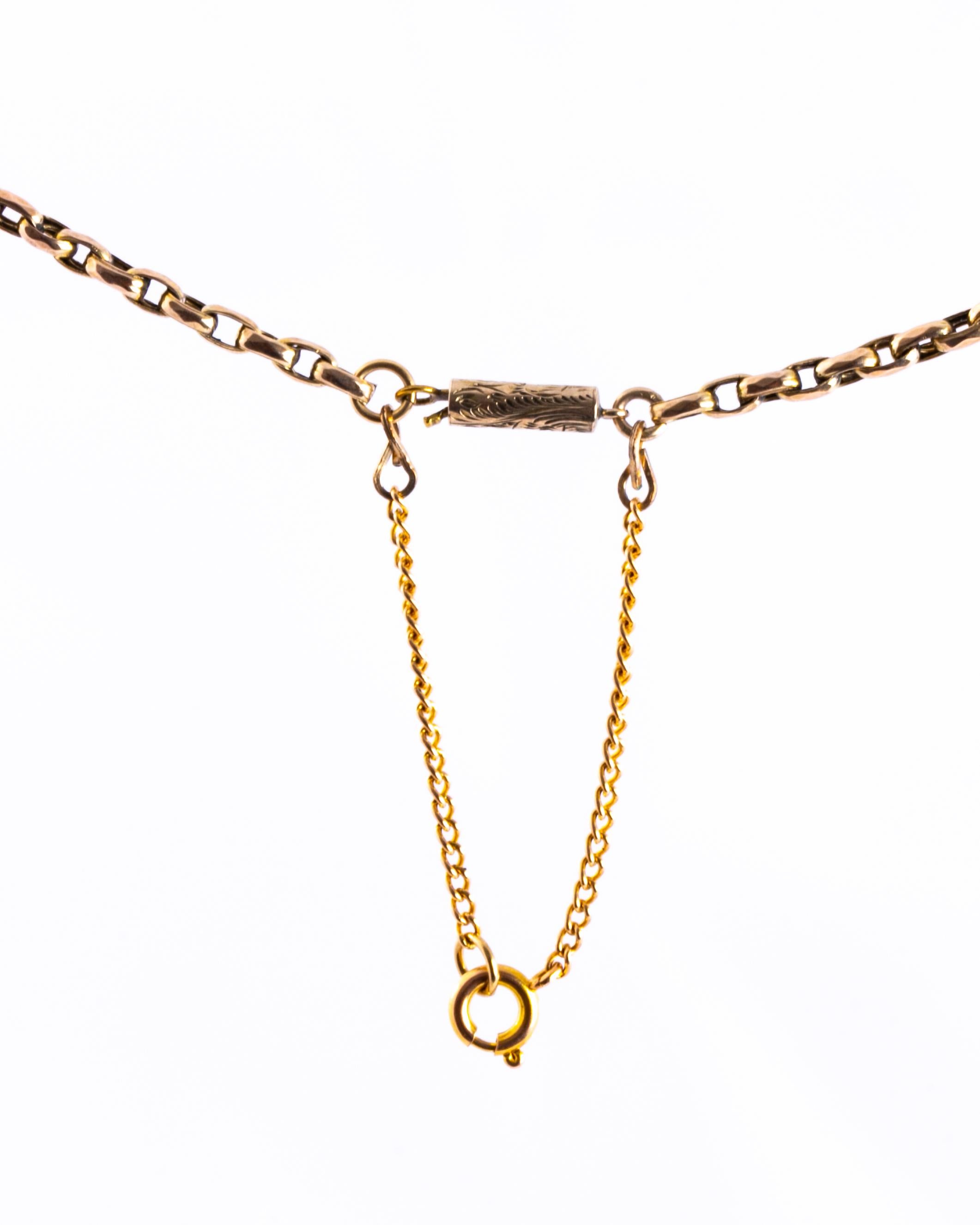 This 9ct yellow gold necklace is made up of snake like link chain and fastens using a gorgeous engraved barrel clasp and comes with a safety chain. 

Length: 38cm 
Width: 2mm 

Weight: 5.53g