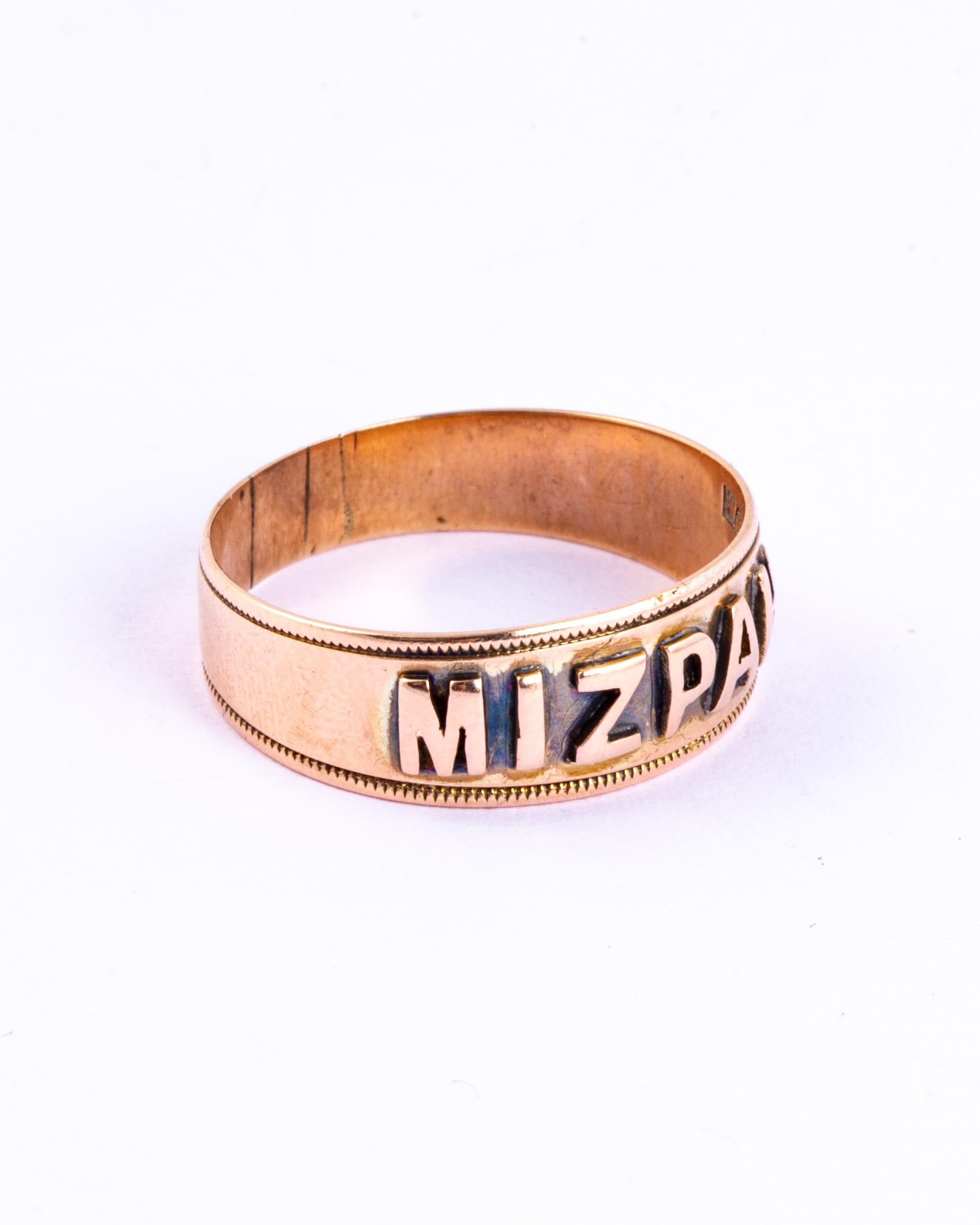 This wonderful antique ring dates from the late Victorian period. It is embossed with the word 