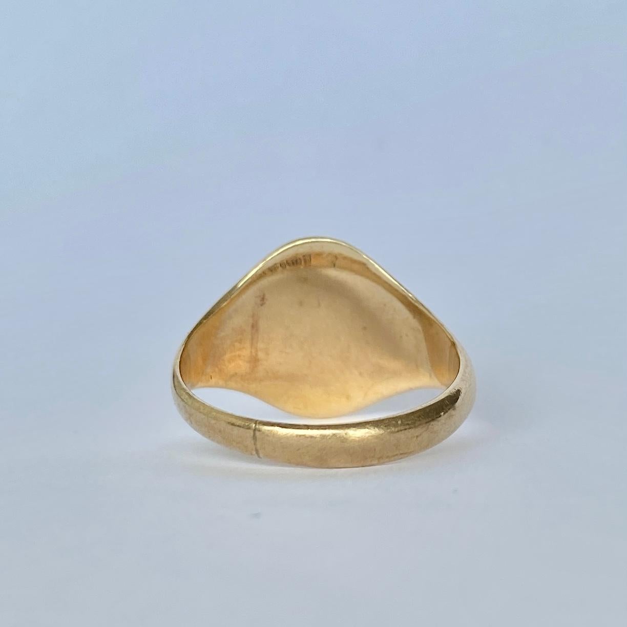 The fluid scroll font which reads 'JHL' is finely engraved onto the face of this ring. The shoulders are smooth and carry on down into a plain band modelled in 9ct gold. This signet ring is fully hallmarked Chester 1856. 

RIng Size: O or 7 1/4