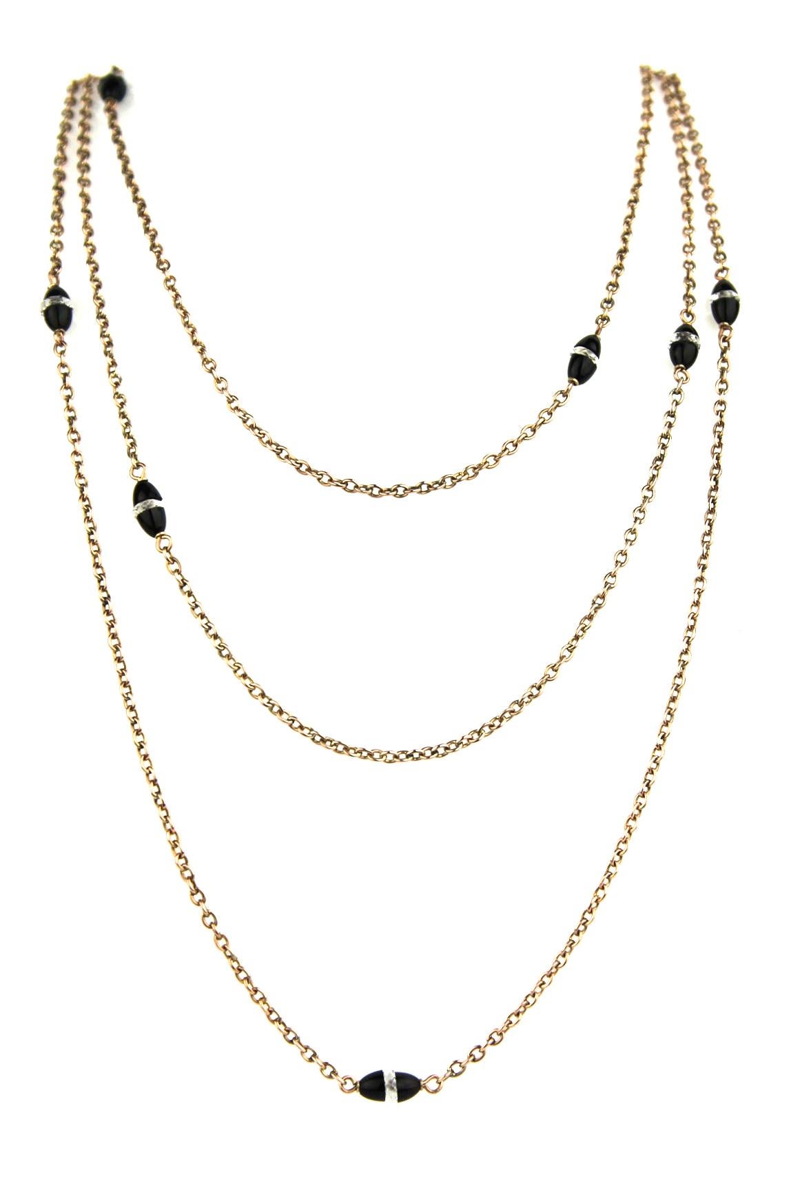 Victorian 9 carat Rose Gold Trace Link Guard Chain Necklace with Onyx and Rock Crystal Beads. Could be able to wear as 3 row, 2 row or one long chain. 
Popular in the early 19th century, the guard chain was commonly used to suspend everyday