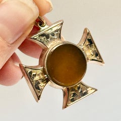 Victorian 9 Carat Rose Gold Ornate Cross Locket Set with Carnelian