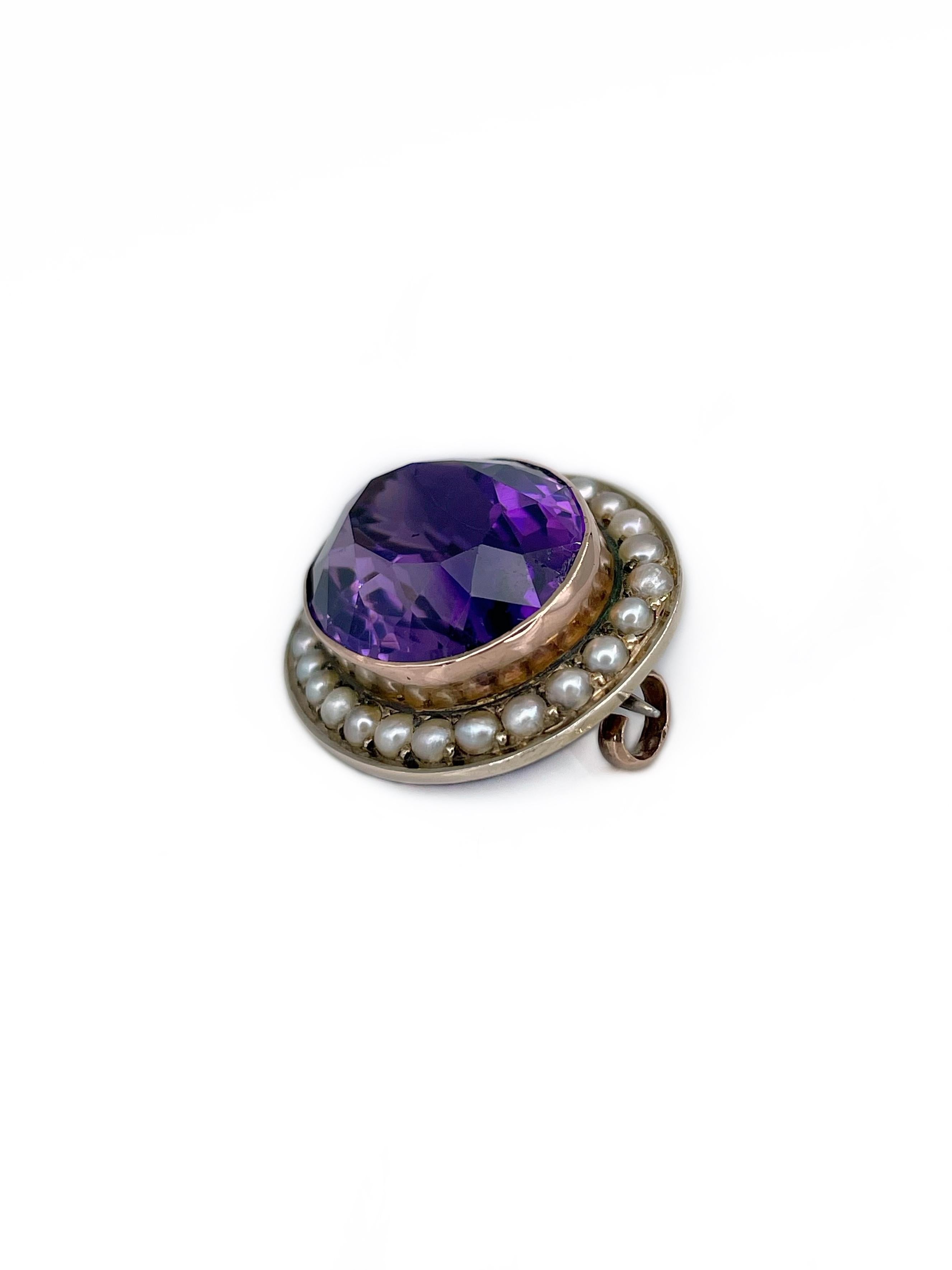 It is a lovely Victorian oval pin brooch crafted in 9K yellow gold. Circa 1890. 

The piece features an amazing purple colour oval cut amethyst. The gem is surrounded by small seed pearls. 

Has a C clasp and a tiny loop (possibly for a chain).