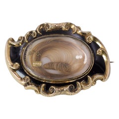 Victorian 9 Karat Gold, Black Enamel and Hair Mourning Brooch