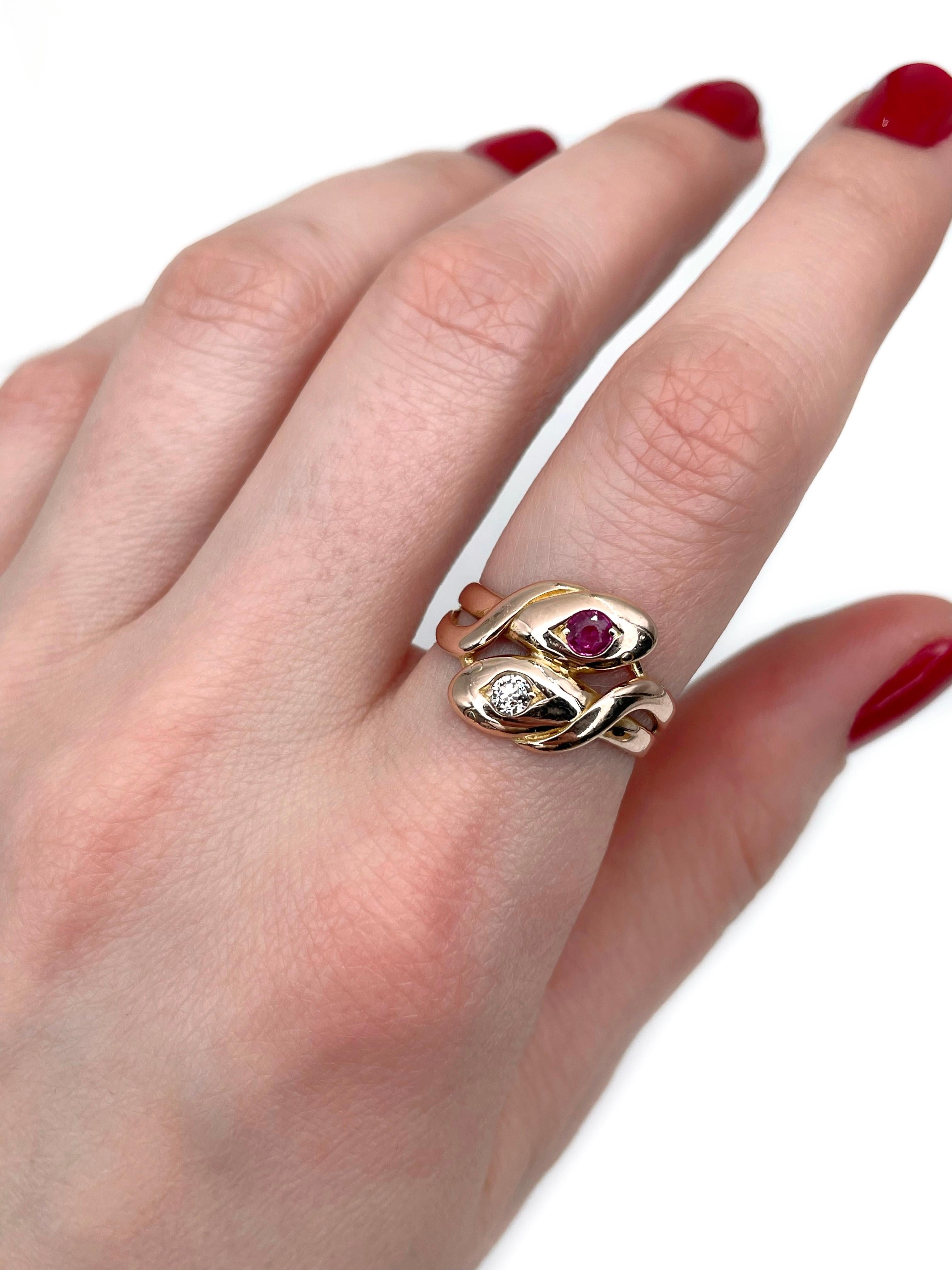 This is a lovely Victorian double snake ring crafted in 14K yellow gold. Circa 1890. 

The piece features:
- 1 ruby, round cut, 0.18ct, stpR 5/4, SI
- 1 diamond, old cut, 0.10ct, RW-W, VS

Weight: 4.21g
Size: 17.25 (US 6.75)

IMPORTANT: please ask