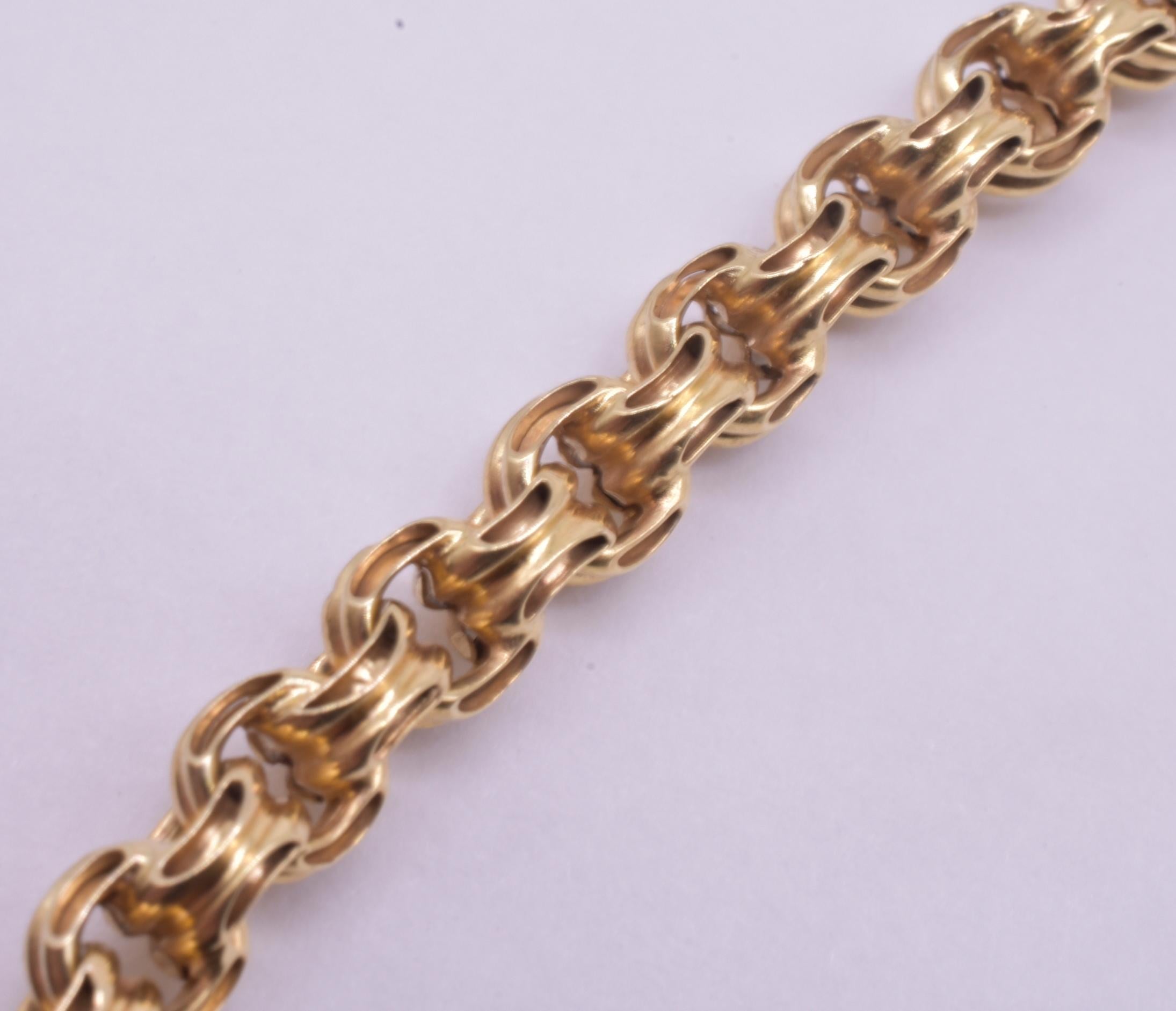 Victorian 9 Karat Love Knot Long Guard Watch Chain In Excellent Condition For Sale In Baltimore, MD