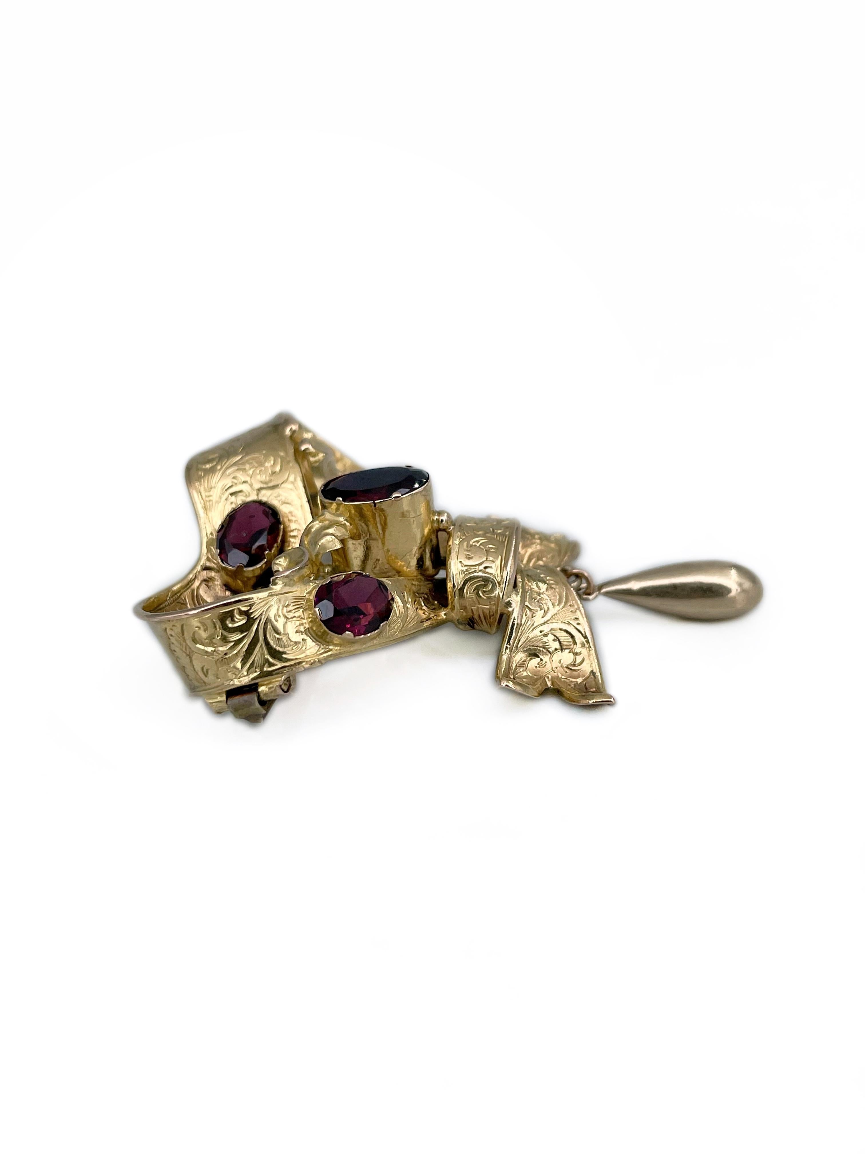 Oval Cut Victorian 9 Karat Yellow Gold Garnet Bow Pin Brooch For Sale