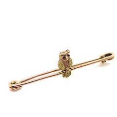 Broche hibou victorienne en or jaune 9 carats et rubis