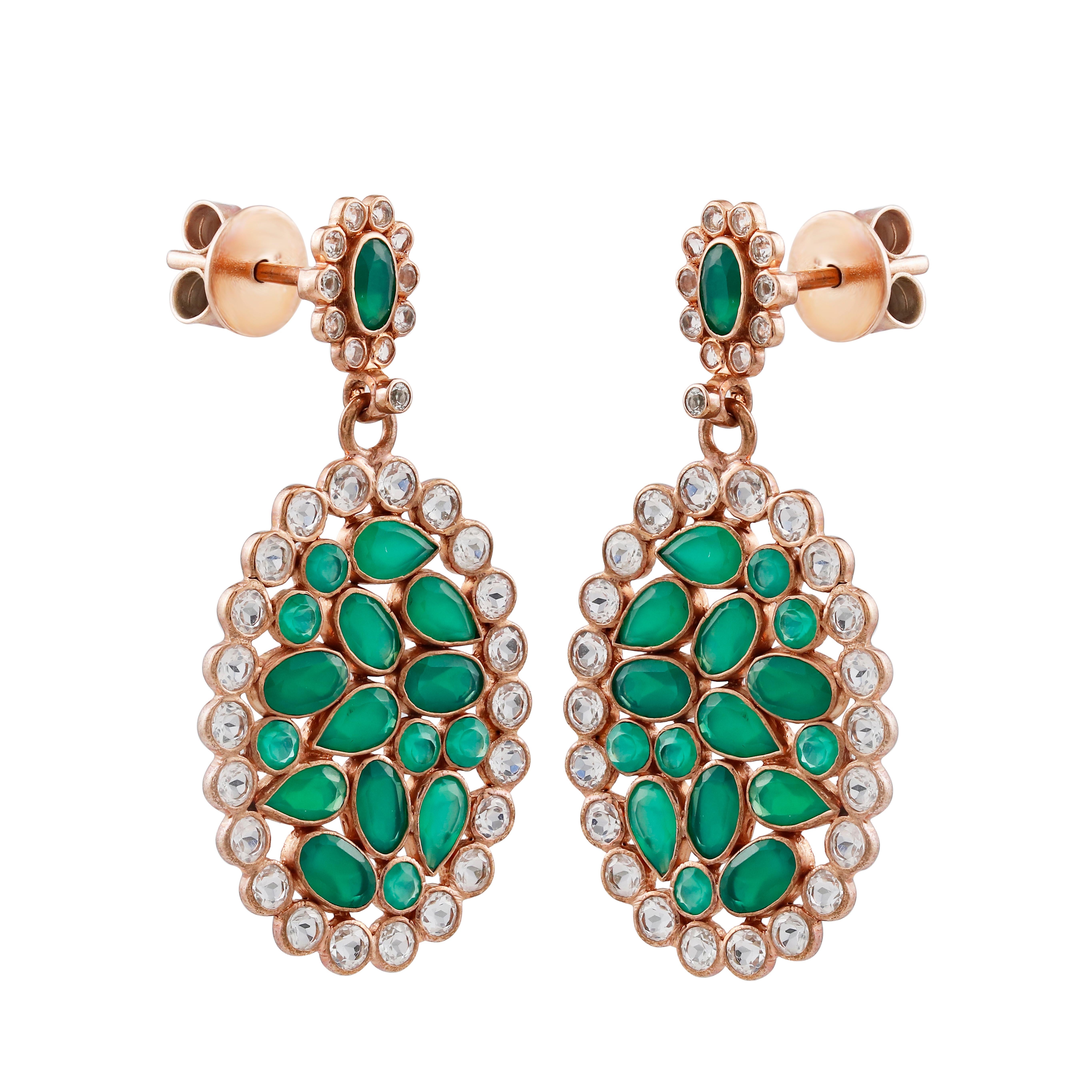 Vibrant gemstones that are sure to take all your attention! Hand created in sterling silver, plated in rose.  Each earring features vivid green onyx haloed in sparkling topazes in the drop and the top. The floral inspired earring adds glamour with