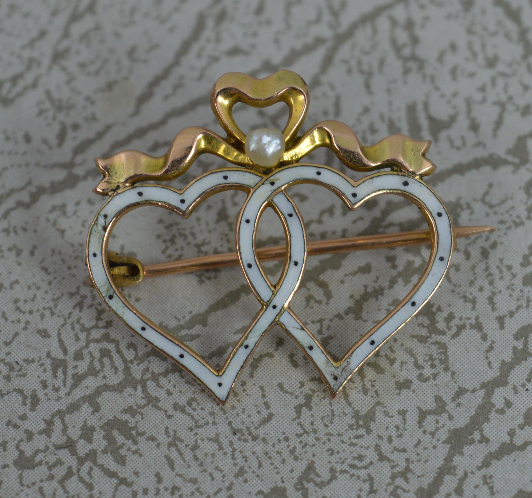 Victorian 9 Carat Gold Enamel and Pearl Double Heart Brooch by Liberty & Co In Fair Condition In St Helens, GB