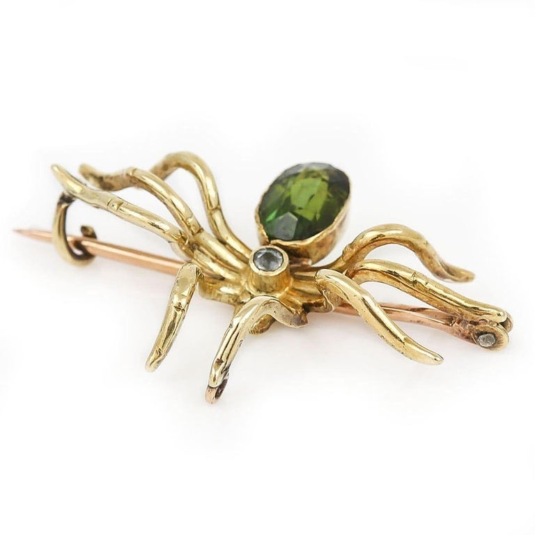 This pretty Victorian 9ct yellow gold gem set spider brooch dates from circa 1890 where it was hand crafted in England. Spider or insect jewellery is highly collectable and was once a symbol of good luck to the wearer during the Victorian era