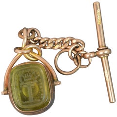 Victorian 9 Carat Gold Swivel Fob with Tbar, Religious Intaglio