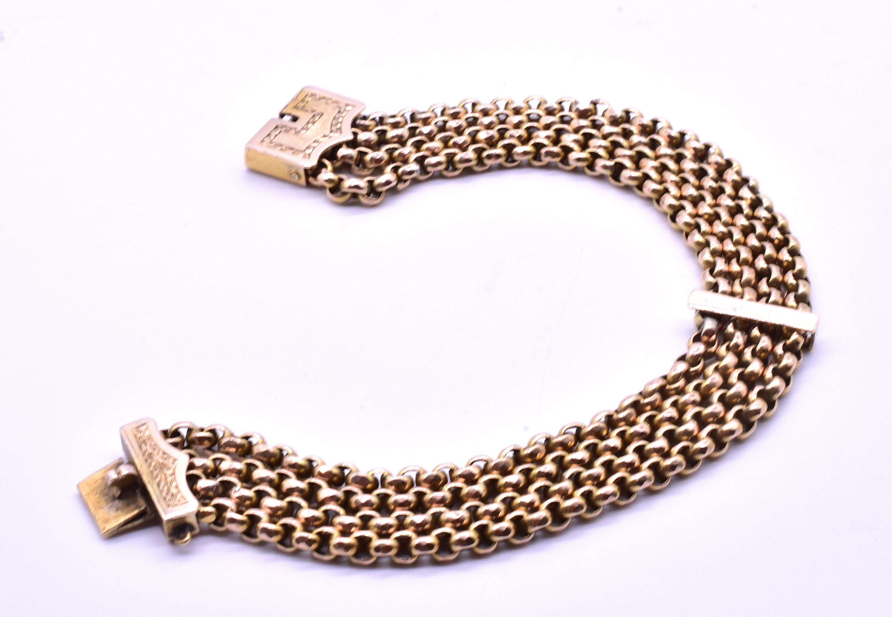 C1890 Belcher Chain bracelet with fancy engraved integral clasp. This bracelet is 7 inches long and .75 inches wide. The 9K gold construction makes it is especially sturdy and strong. And we are in love with the engaving on the clasp which makes the