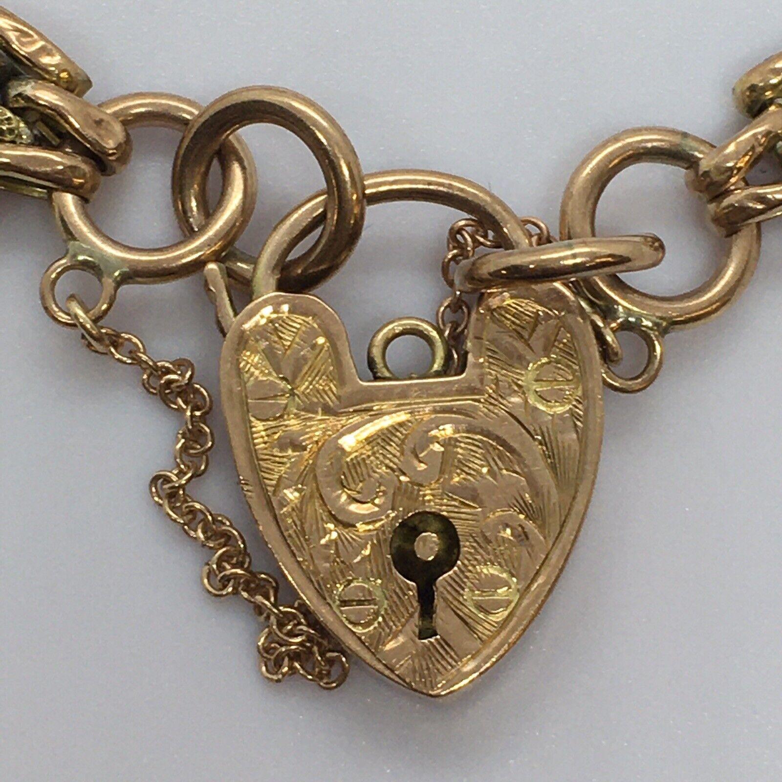 Victorian 9K Gold Vintage Heart Padlock Gate Bracelet UK 7.75 Inch 9.8 gr Clean

In good overall condition, no damage, no evidence of repair, see pictures 

Antique:	Yes	
Shape:	Link
Closure:	Padlock	
Occasion:	Anniversary, Birthday, Christmas,