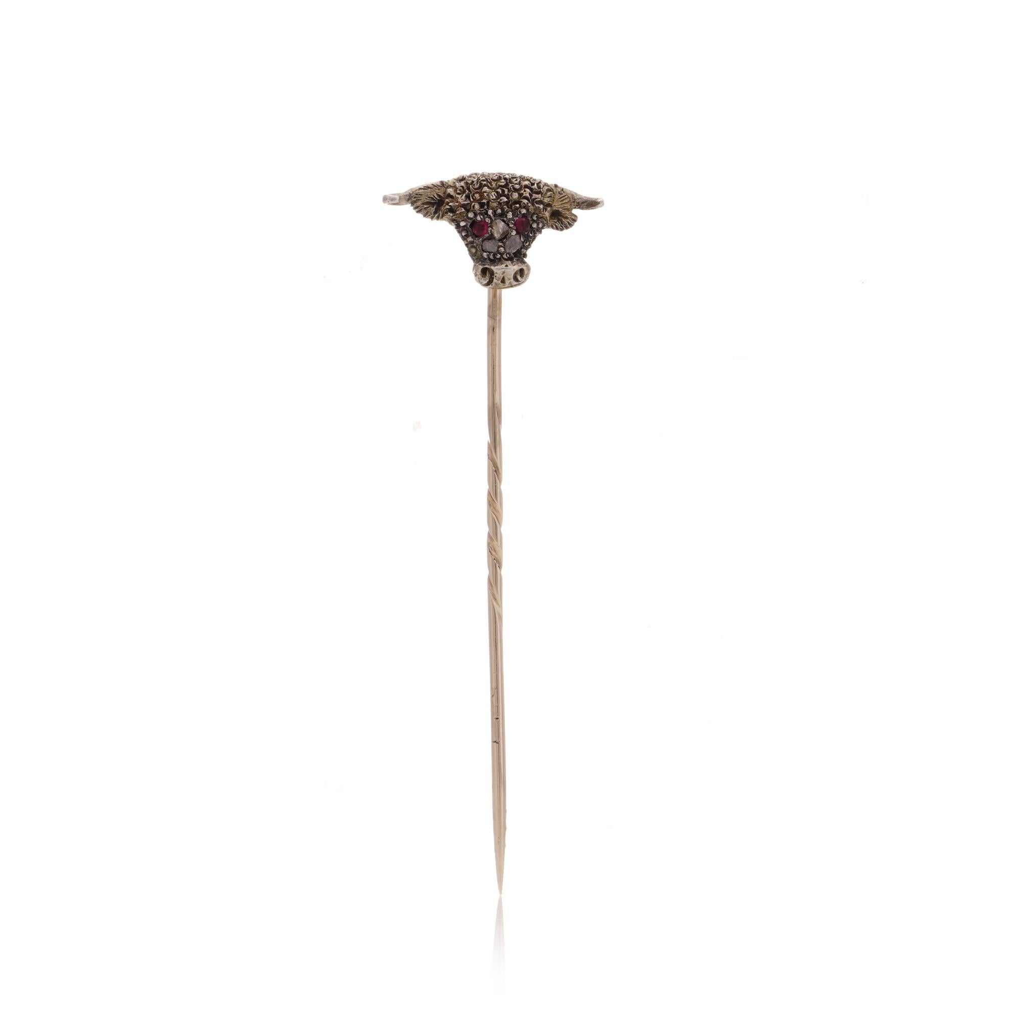 Victorian 9kt gold and silver bull - head stick pin with diamonds and rubies.

Stick pin is crafted from 9kt gold and silver, designed in the shape of a bull's head. This elegant piece showcases the combination of durable silver and warm-toned gold,
