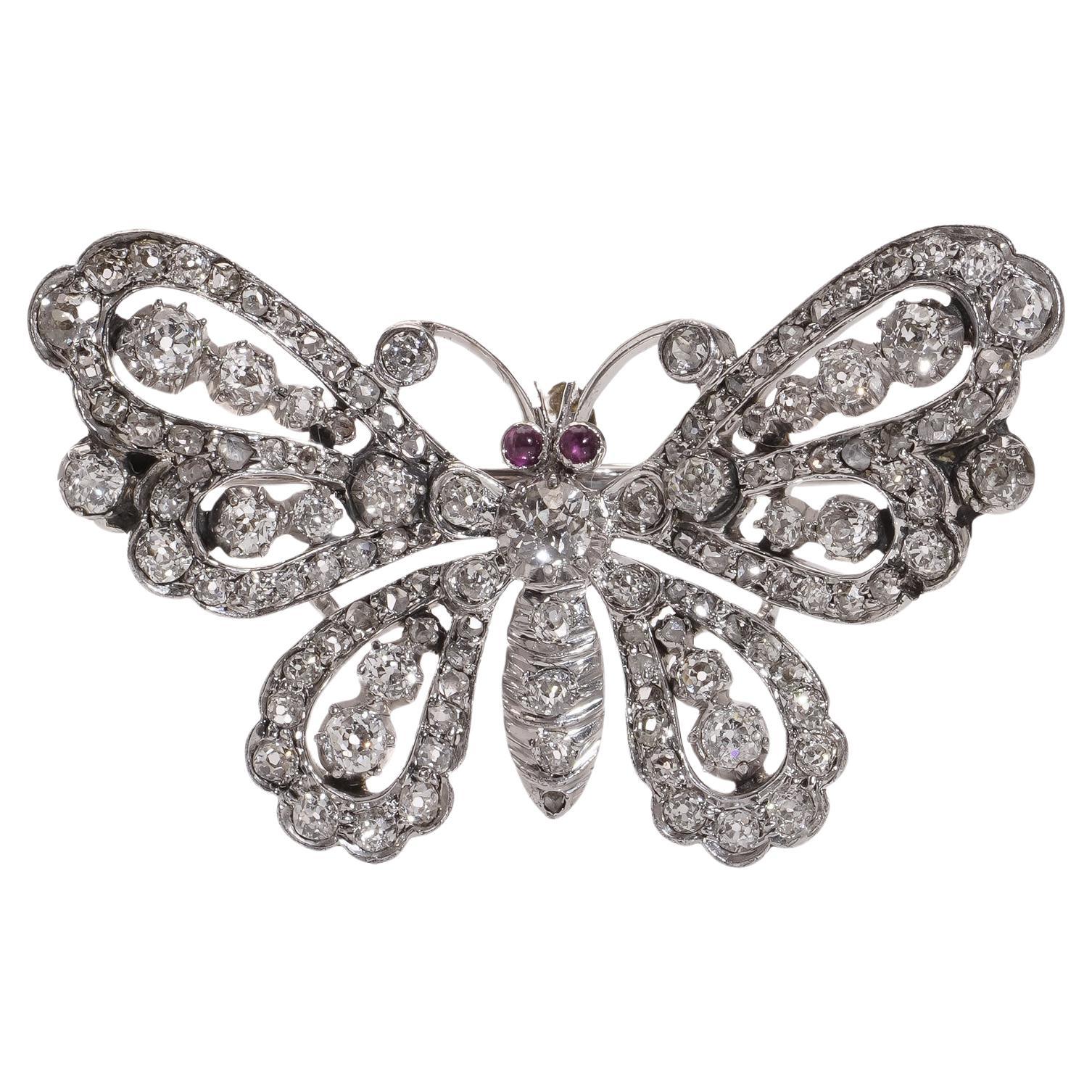 Victorian 9kt gold and silver butterfly brooch with old cut diamonds rubies