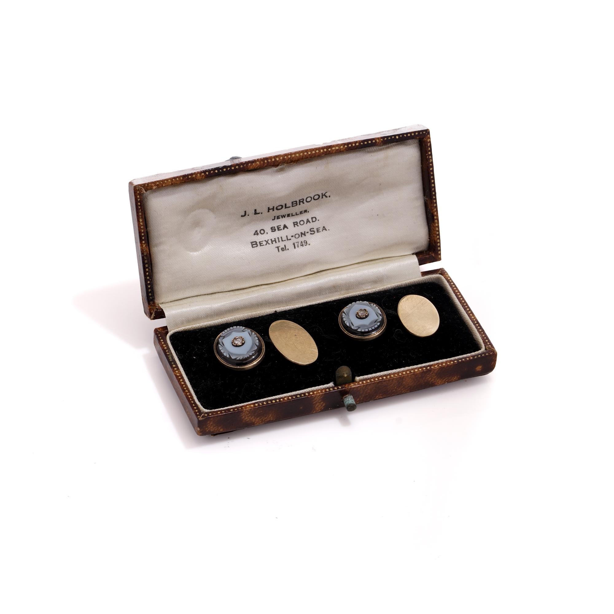 Antique Victorian 9kt. gold and banded agate pair of cufflinks with diamond accents at the centres.
Each cufflinks is set with banded agate carving featuring a crest of shield set with diamond. 
Made in England, Circa 1860 - 1870's
X-ray tested