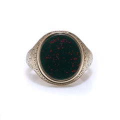VICTORIAN 9KT GOLD BLOODSTONE SIGNET RING WITH OPENING COMPARTMENT, CIRCA 1880s