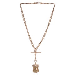 Victorian 9kt. rose gold Albert Chain with Armorial coat of arms pendant
