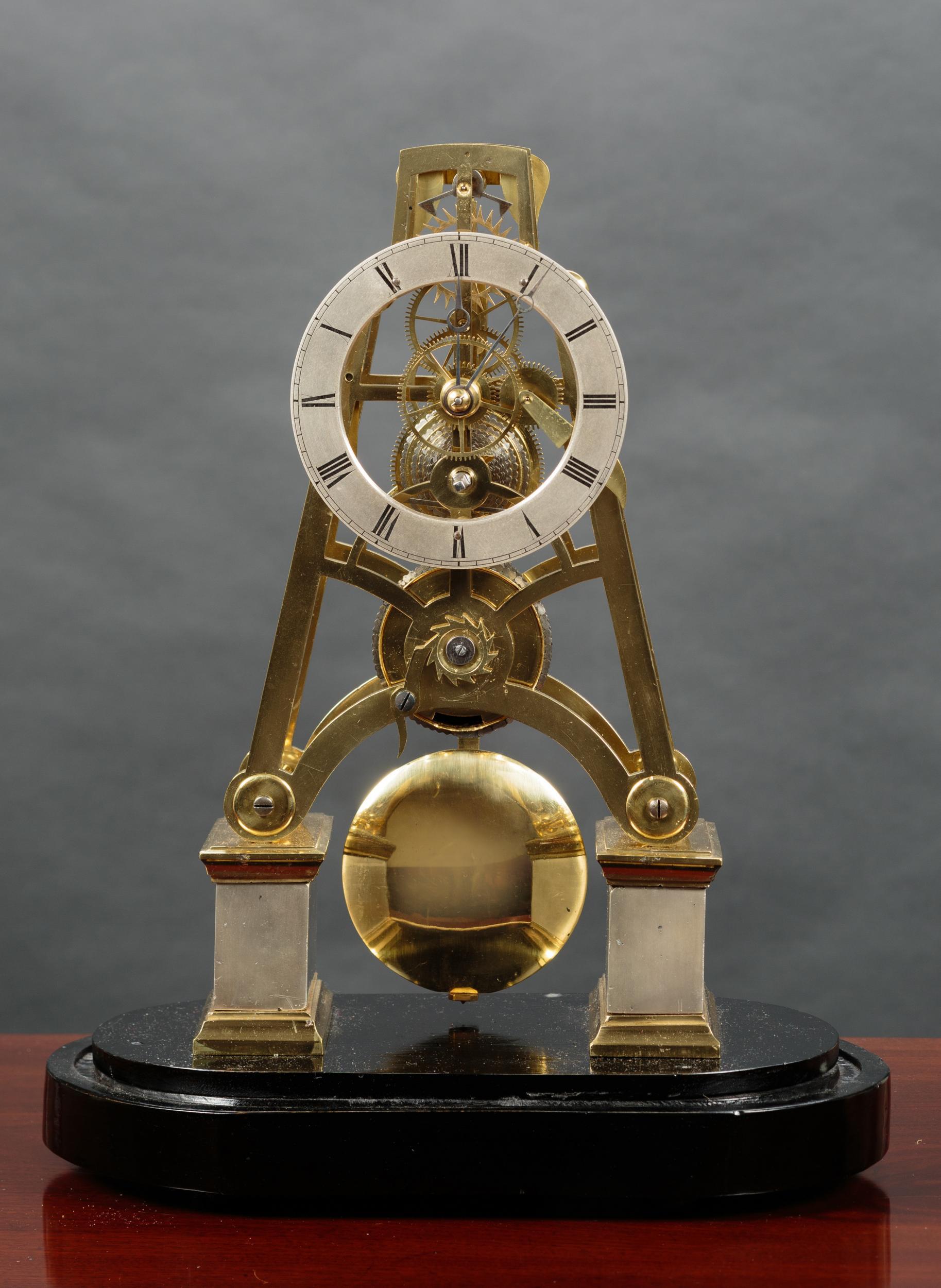 Victorian ‘A’ framed Skeleton clock.

Standing on raised silvered plinths with finely engraved silvered dial with Roman numerals and original ‘blued’ steel hands.

Eight day chain Fusee movement of the highest quality with five and six spoke