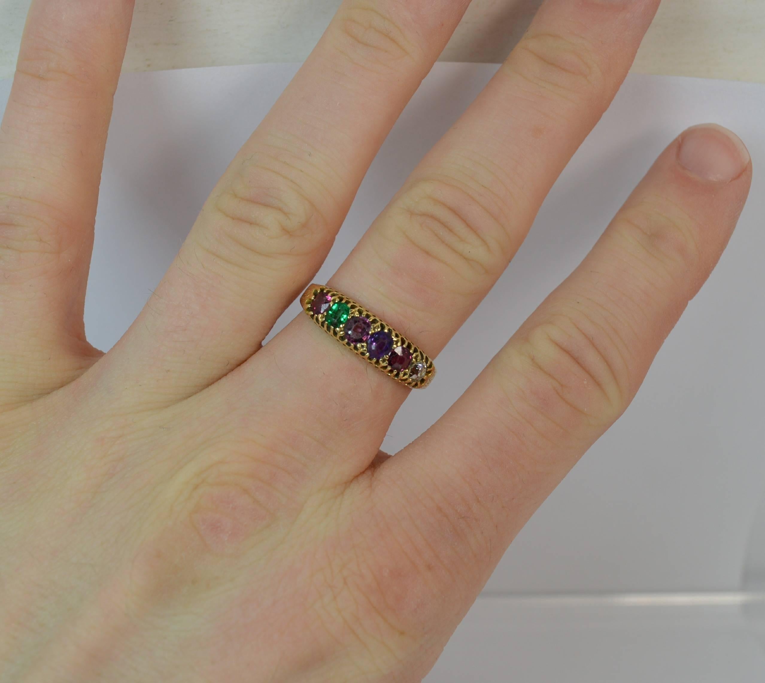 
A very rare ladies mid Victorian period ' REGARD ' design ring.

Set with Ruby Emerald Garnet Amethyst Ruby Diamond gemstones which spell out the word regard.

17mm spread of stones, scroll design above and below, 5.6mm thick band to the
