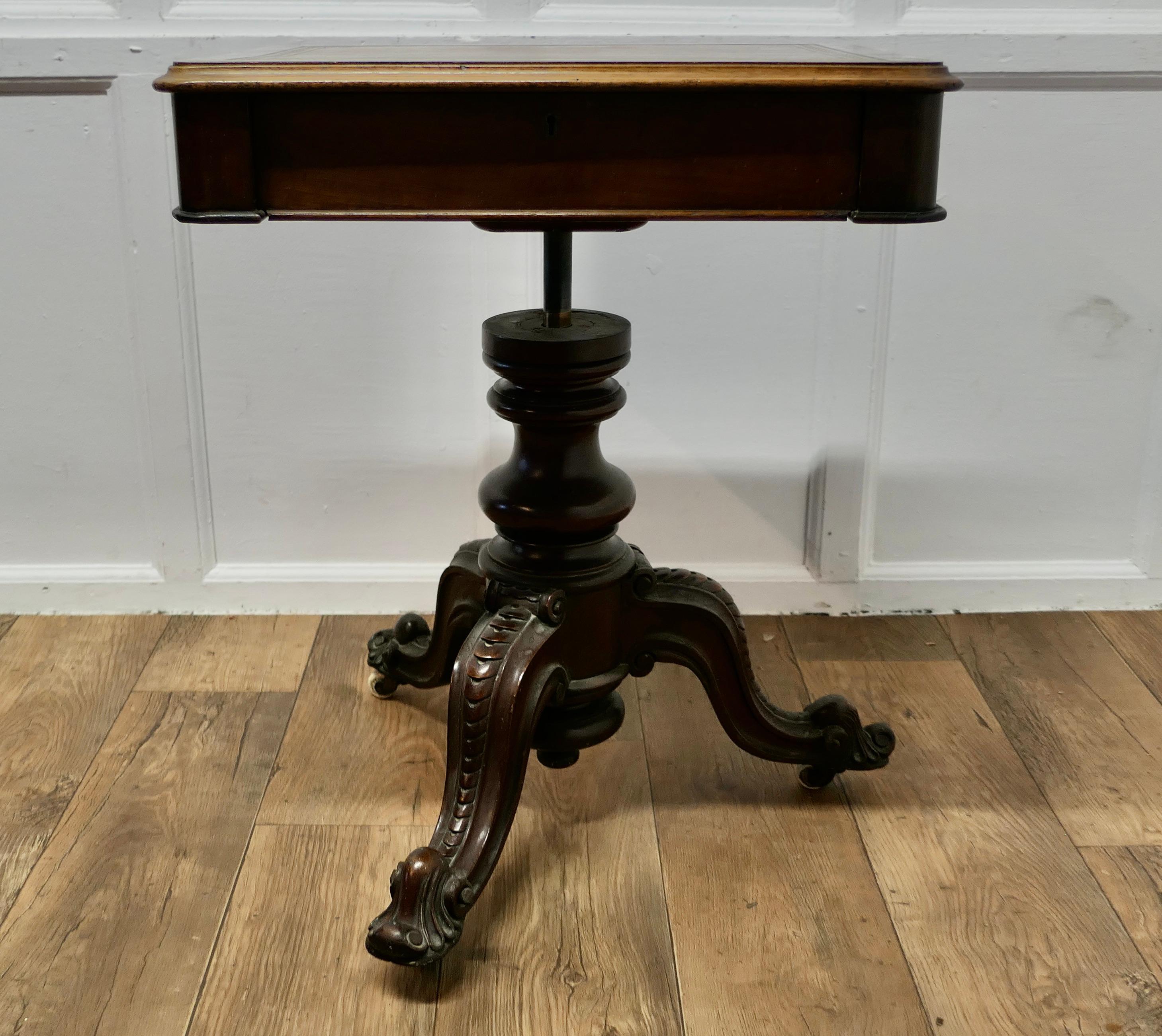 Victorian Adjustable Writing Table

This is a rare piece and a very useful desk, the table is set on a heavily Carved 3 footed leg, set on this there is a leather top desk with a drawer, the desk swivels on the leg and rises and lowers to the