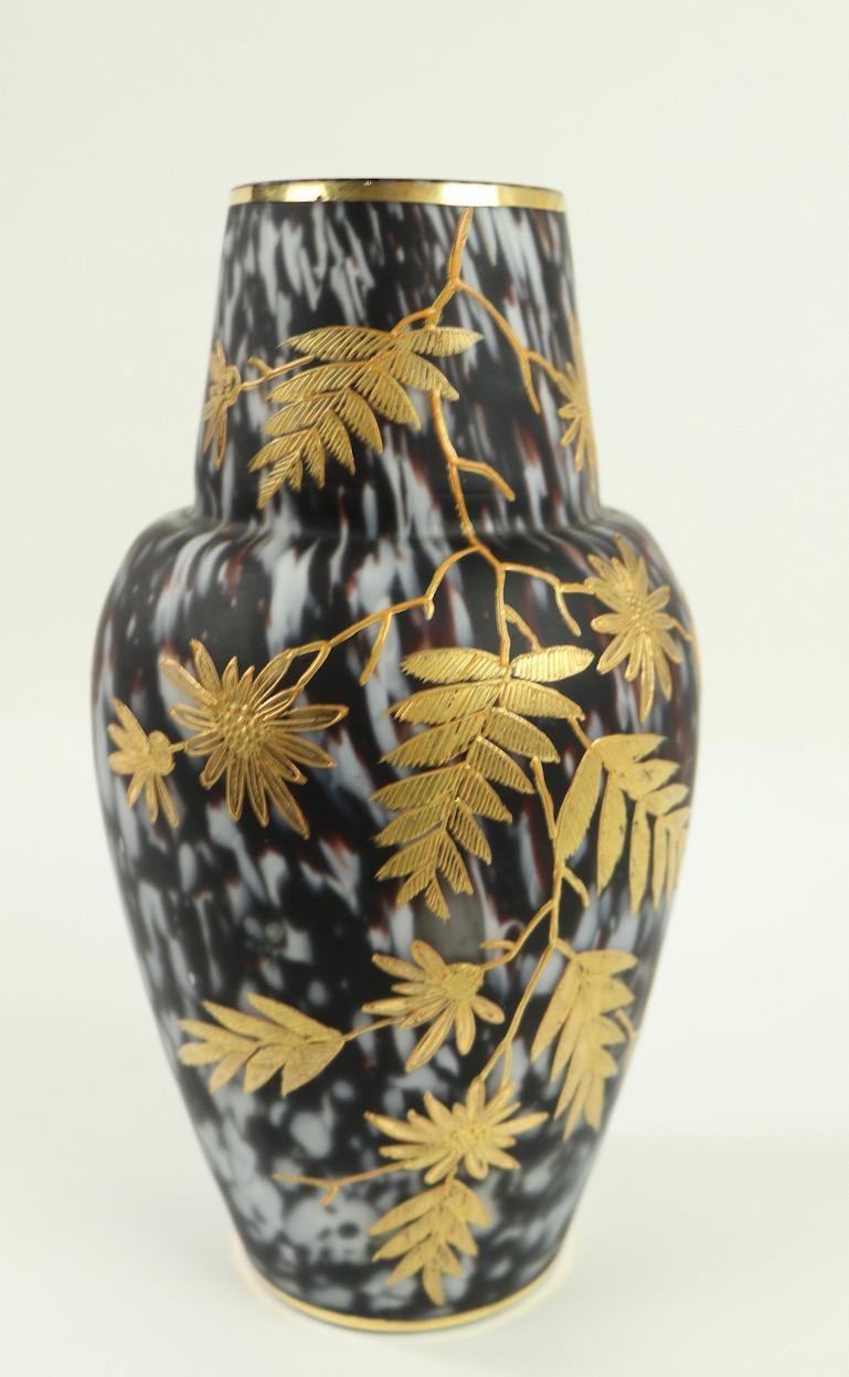 Exquisite Aesthetic movement, Bohemian, Victorian Art Glass vase having a purple spatterware body and applied gold foliate decoration.
This example is in excellent condition, free of damage or repairs.
Possibly Webb or Harrach, unsigned.
 