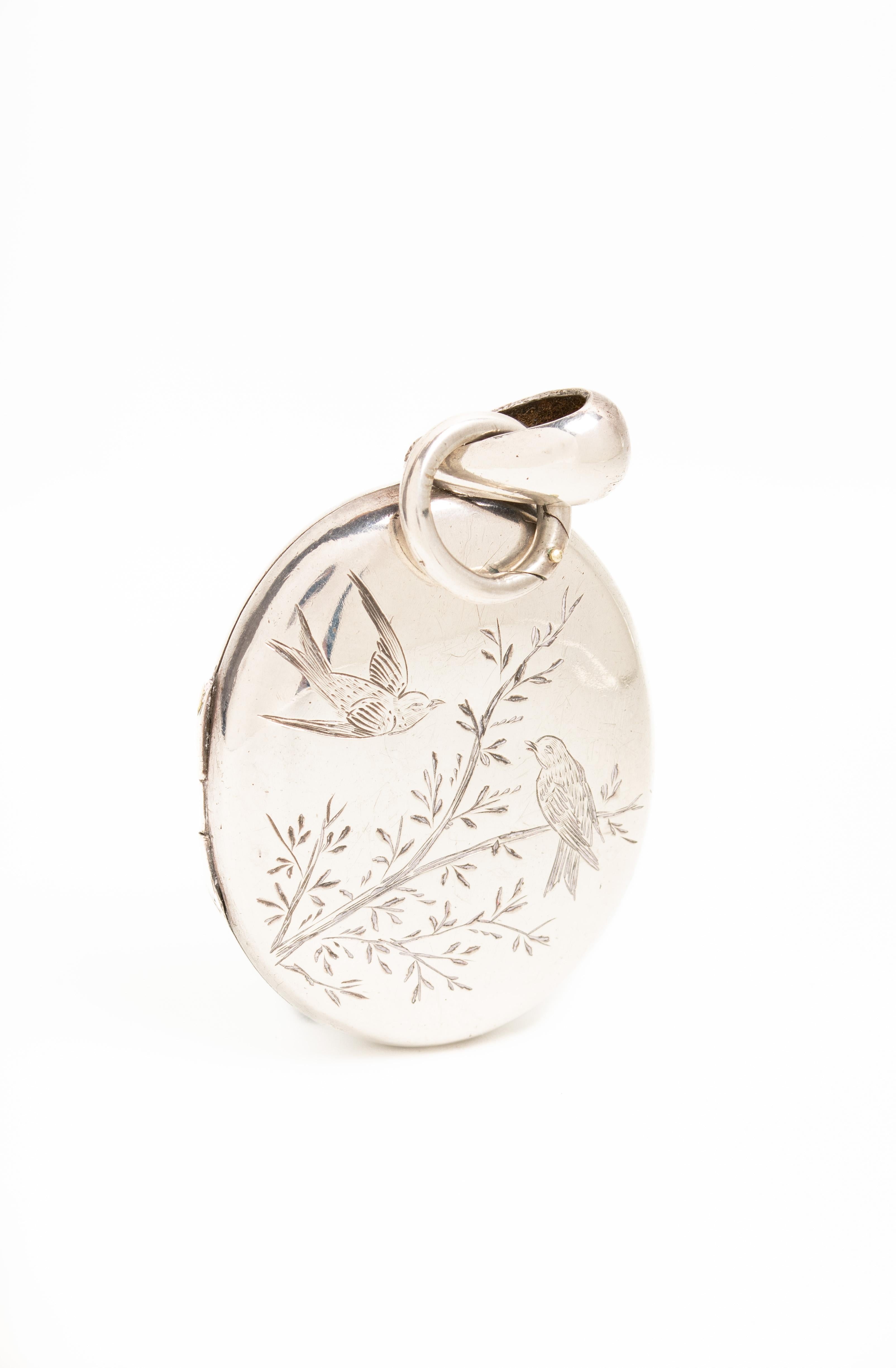 Victorian Aesthetic Movement Silver Locket With A Pair Of Swallows In Good Condition For Sale In Portland, England