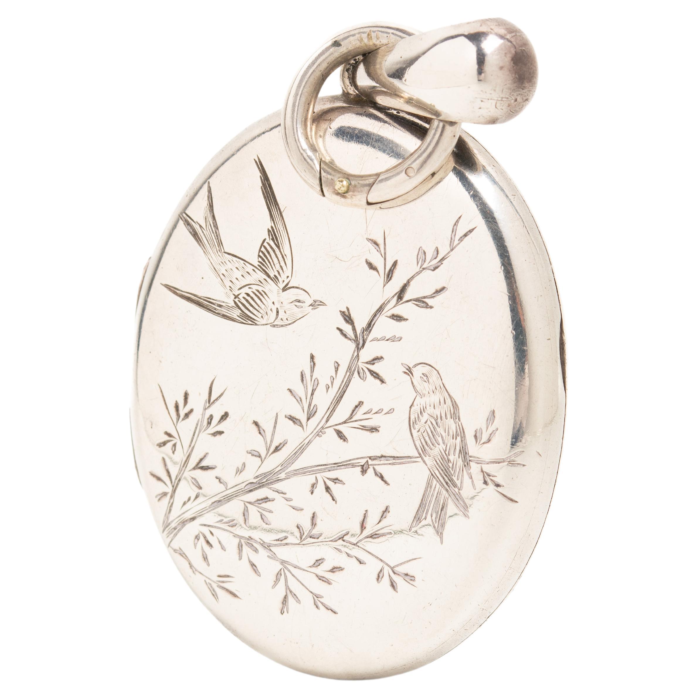 Victorian Aesthetic Movement Silver Locket With A Pair Of Swallows For Sale
