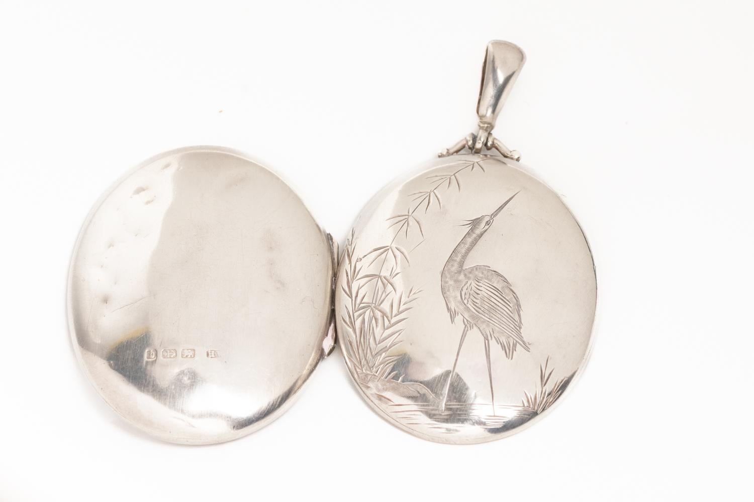 Women's Victorian Aesthetic Movement Sterling Silver Bird Locket For Sale