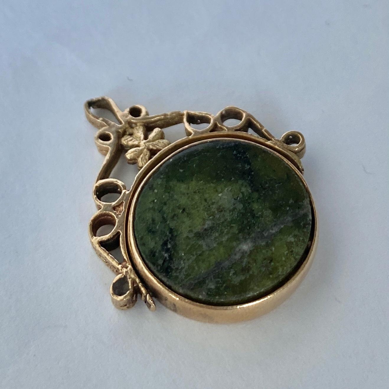 This gorgeous green marbles agate is full of detail. The frame has scroll detail and also has a shamrock under the loop. Fully hallmarked Dublin 1847.

Stone Diameter: 18mm

Weight: 5.3g
