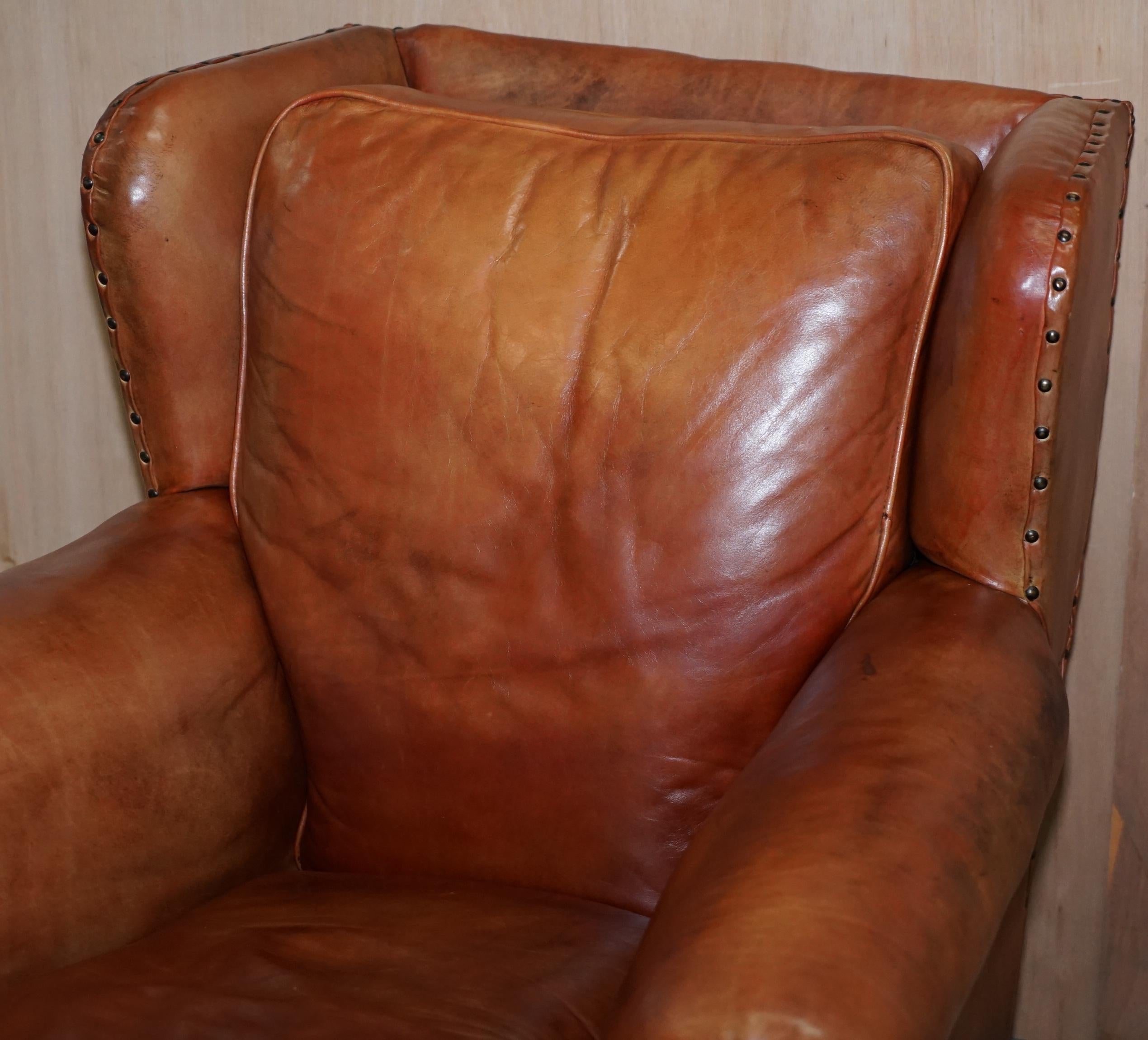 19th Century Victorian Aged Brown Leather Armchair and Matching Footstool Feather Filled Seat