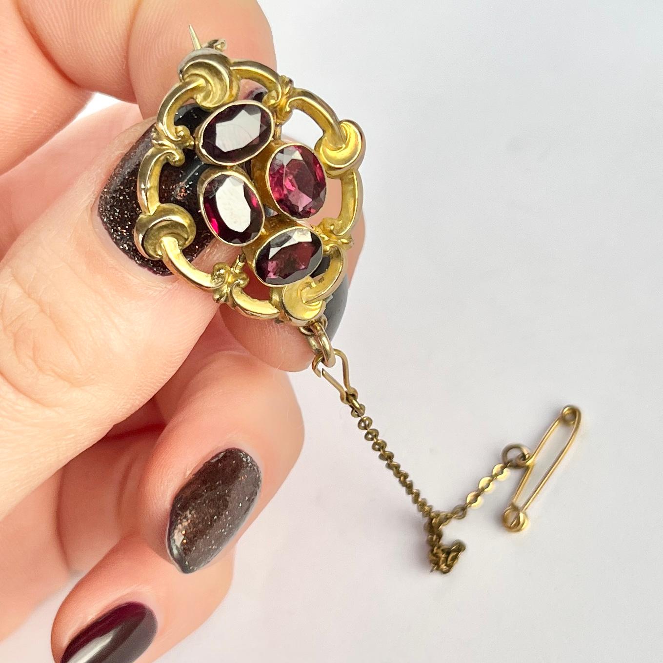 This stunning brooch would also make a stunning pendant! There are four almandine garnets set into the decorative brooch, modelled in 9ct gold. 

Brooch Dimensions: 23x27mm
Stone Dimensions: 5.5x7mm

Weight: 3.4g