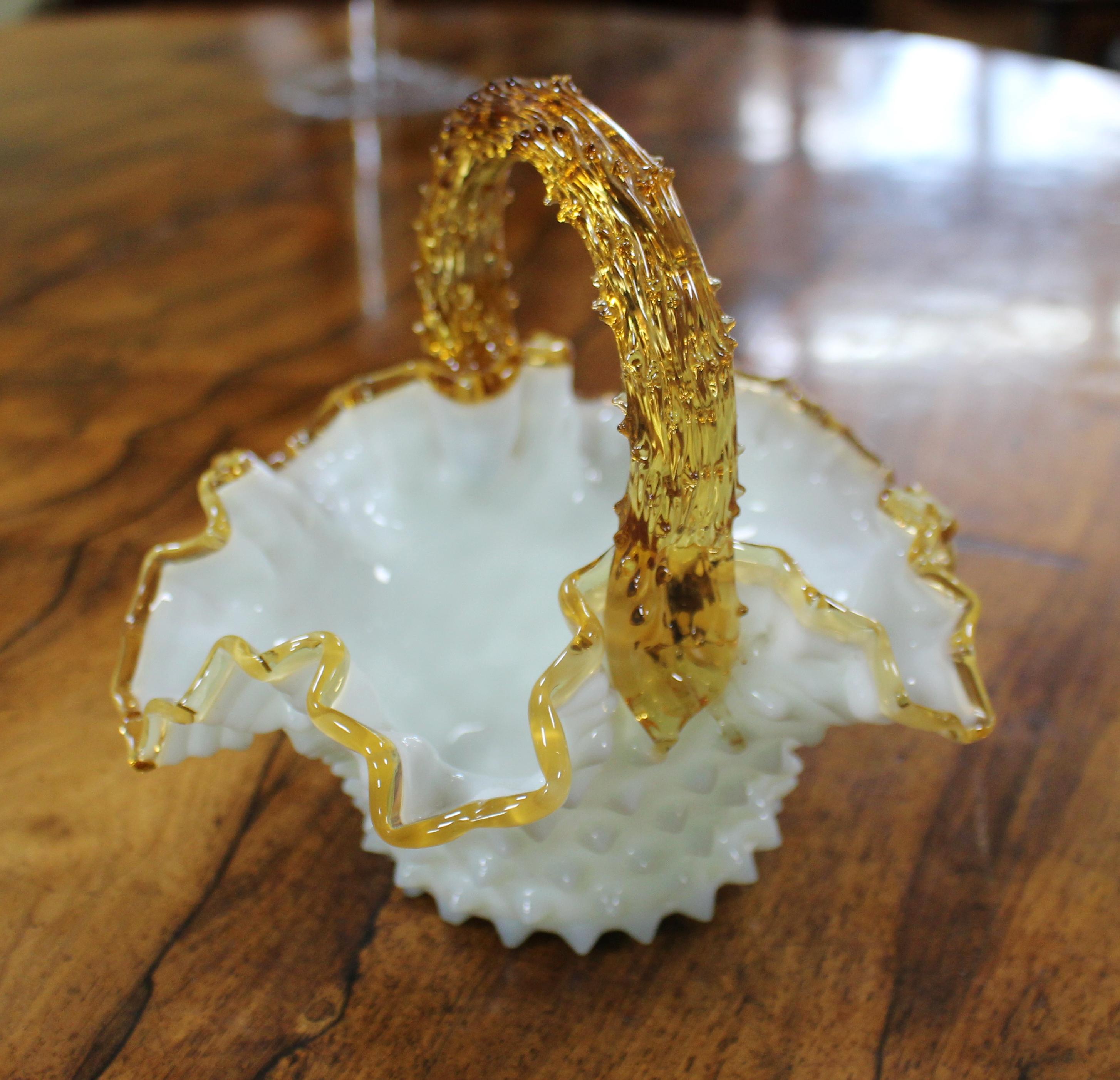 

Period 19th century
Decoration Amber topped milk glass bowl of ornate decorative scalloped form with amber handle
Width 18 cm / 7 in
Depth 16 cm / 6 1/4 in
Height 17 cm / 6 1/2 in
Condition Very good original condition. Slight rubbing to