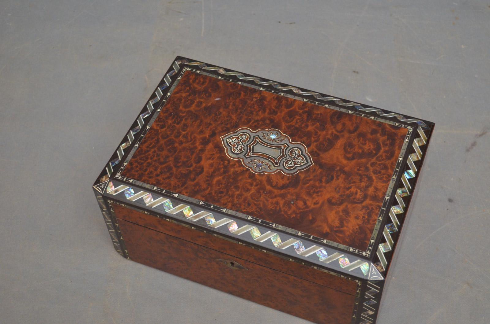 Sn4120 fine Victorian amboyna jewellery/sewing box with finely inlaid hinged lid which opens to reveal original mirror and lift out tray with compartments and storage below. This antique box retains its original finish, color and patina, all in