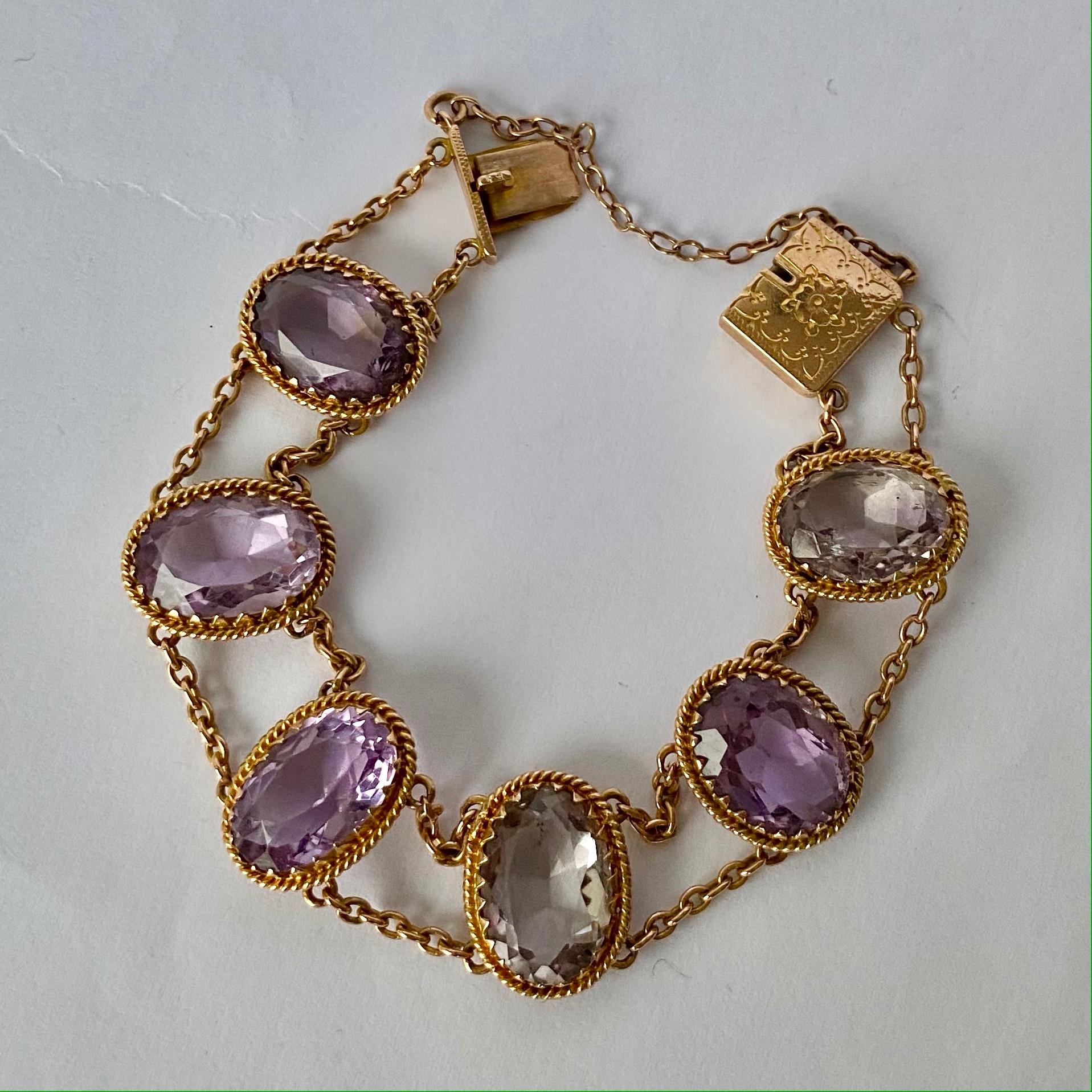 Such a decorative piece! This bracelet is made up of six amethyst stones. The decorative 9ct gold clasp with engraving finishes this bracelet off perfectly.

Length: 16cm
Stone Dimensions: 14x9mm

Weight: 16.2g