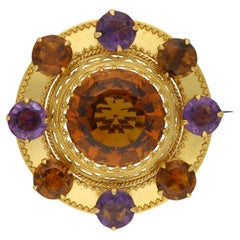 Antique Victorian amethyst and citrine brooch, circa 1860.