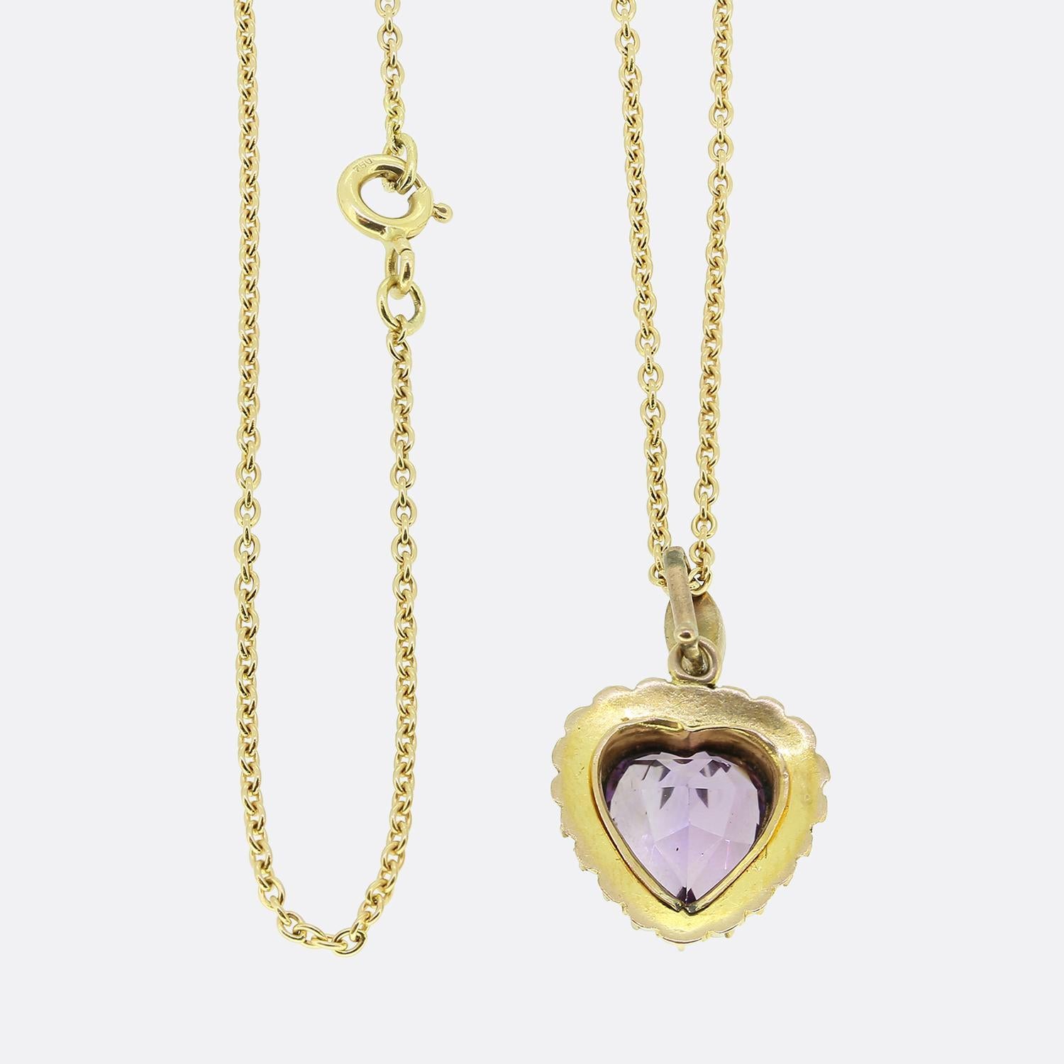 Here we have a gorgeous amethyst and pearl set pendant necklace. This antique pendant showcases an expertly crafted heart shaped amethyst possessing a stunning purple colour tone. This focal gemstone is then framed by a single row of perfectly
